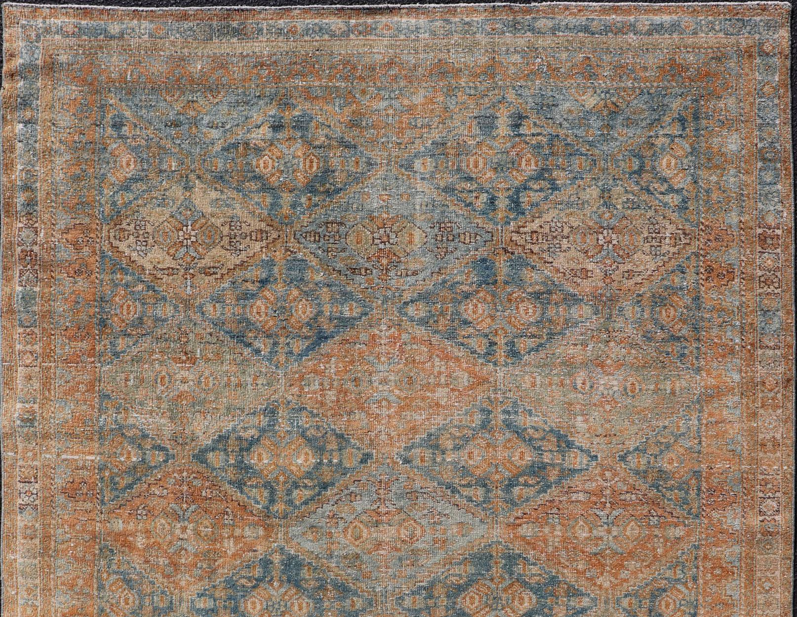 Wool Antique Persian Kurdish Rug with All-Over Geometric Medallion in Orange & Blue  For Sale