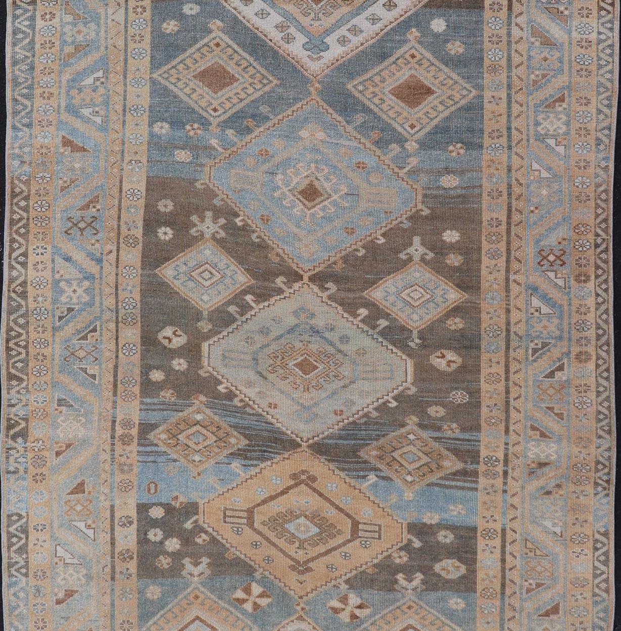  Antique Persian Kurdish Rug with All-Over Geometrics by Keivan Woven Arts.

Measures: 5'4 x 10'5 

Softly colored antique Persian Gallery Kurdish rug with all-over geometric and diamond design.
 
Keivan Woven Arts / rug EMB-9634-P13861, country of