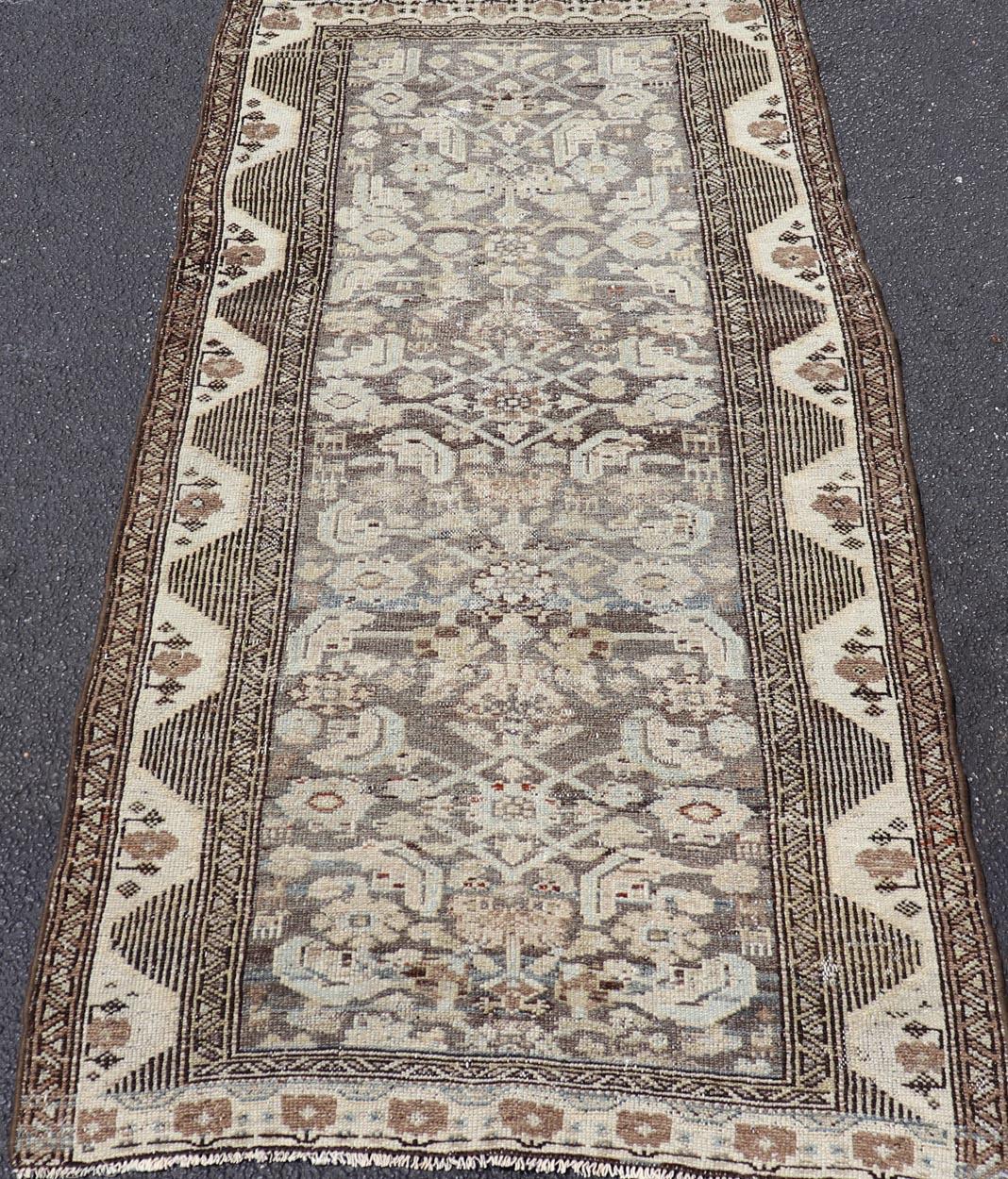 Measures: 3'1 x 6'0 
Antique Persian Kurdish Rug with Geometric Motifs and Neutral Tones 3'1 x 6
Keivan Woven Arts/ rug/A24-0603, country of origin / type: Iran / Kurdish, circa 1900.

Antique Persian Kurdish rug showcasing the bold artistry and