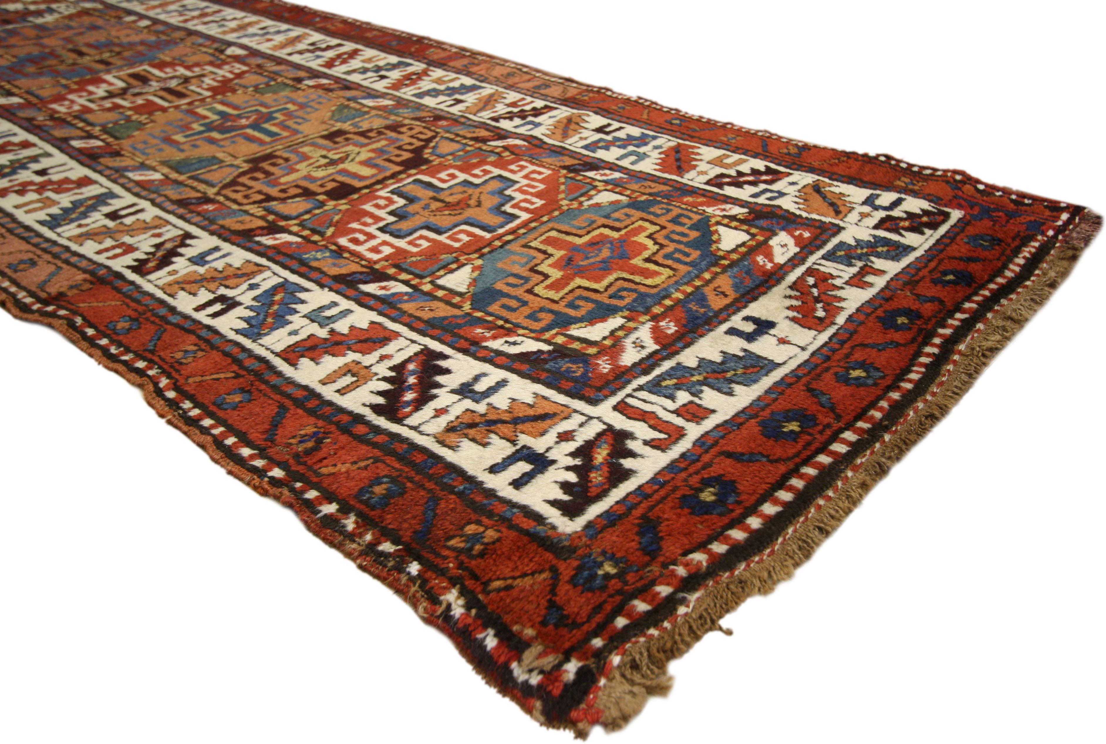 70590, antique Persian Kurdish rug with Nomadic Raconteur style, hallway runner. An antique artifact of nomadic Kurds, this Persian rug was handwoven with rich ornament and colors throughout. Depth and beauty abound in this antique Kurdish Rug with