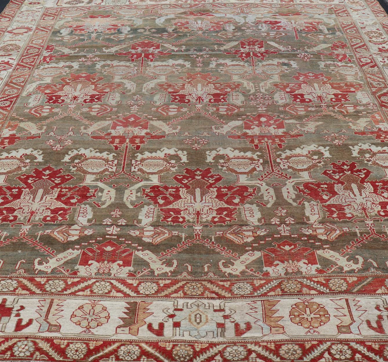 Antique Persian Large Scale Tribal Design Bakhtiari Rug in Multi Colors In Good Condition For Sale In Atlanta, GA