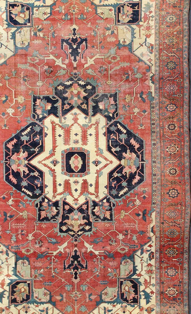 Antique Persian Large Serapi Rug in Red, Blue, and Ivory For Sale at