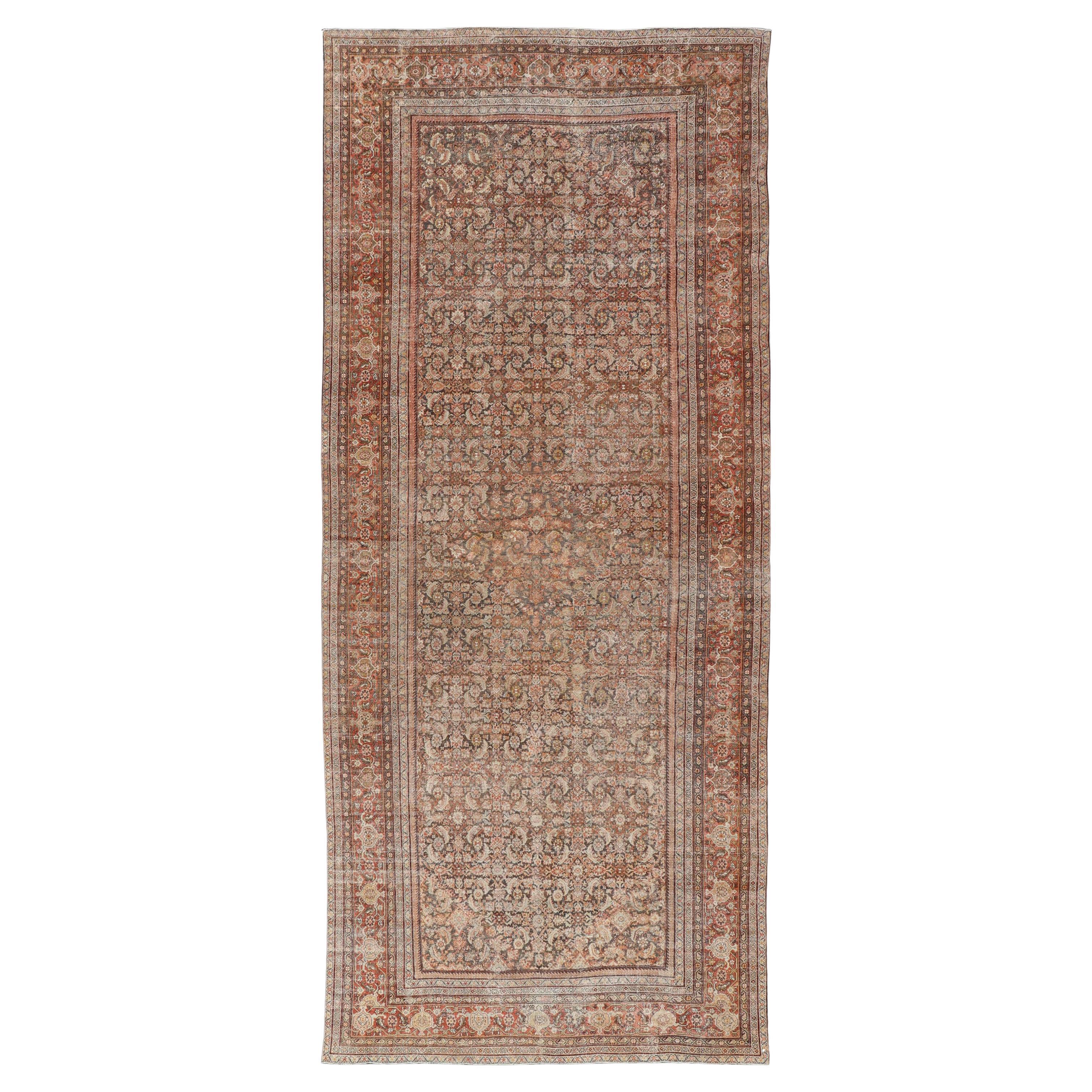 Antico tappeto persiano Sultanabad Rugs di grandi dimensioni con toni caldi e terrosi 11'7 x 26'7 in vendita