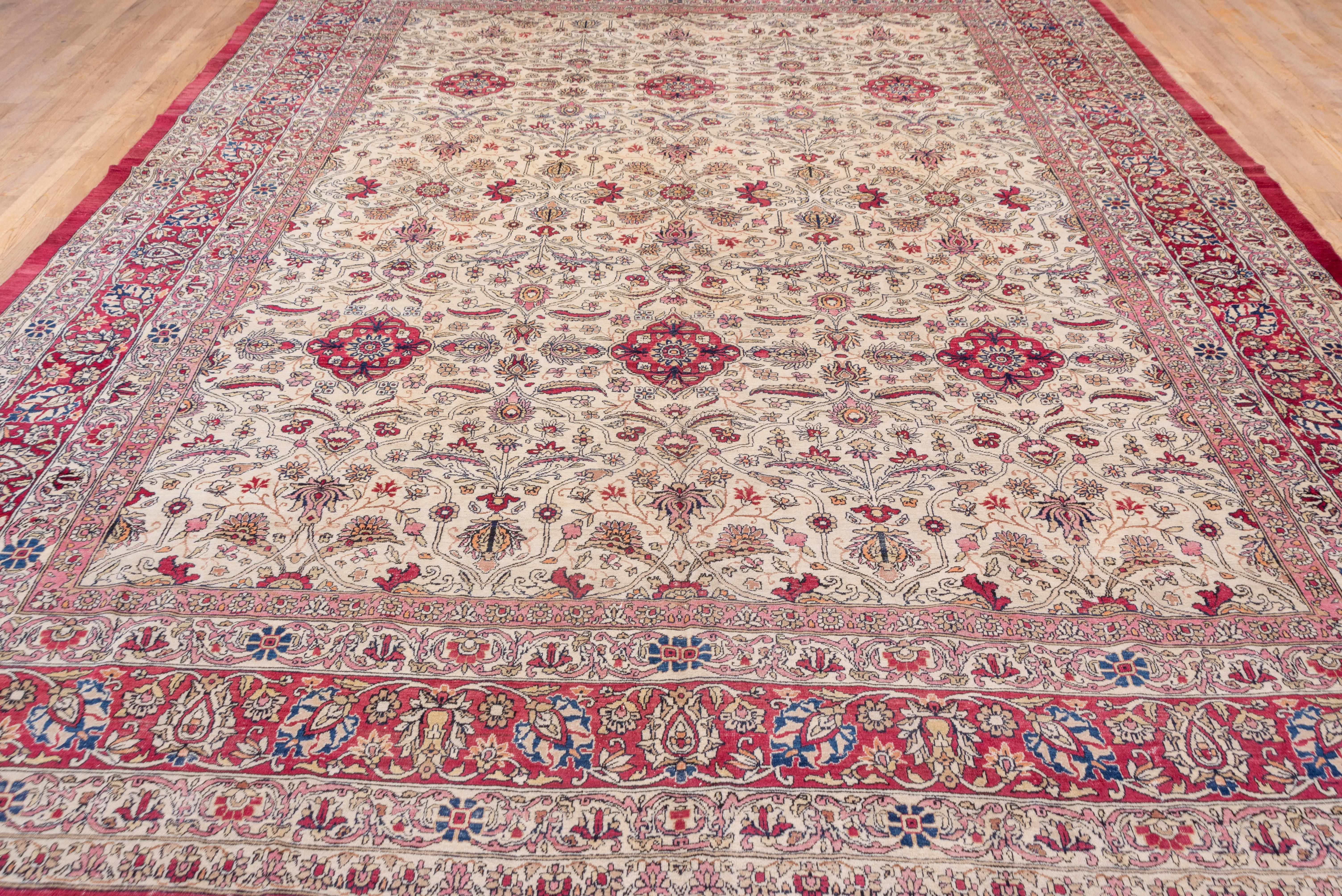 Hand-Knotted Antique Persian Lavar Kerman Carpet, Ecru All-Over Field, Red Pink Borders For Sale