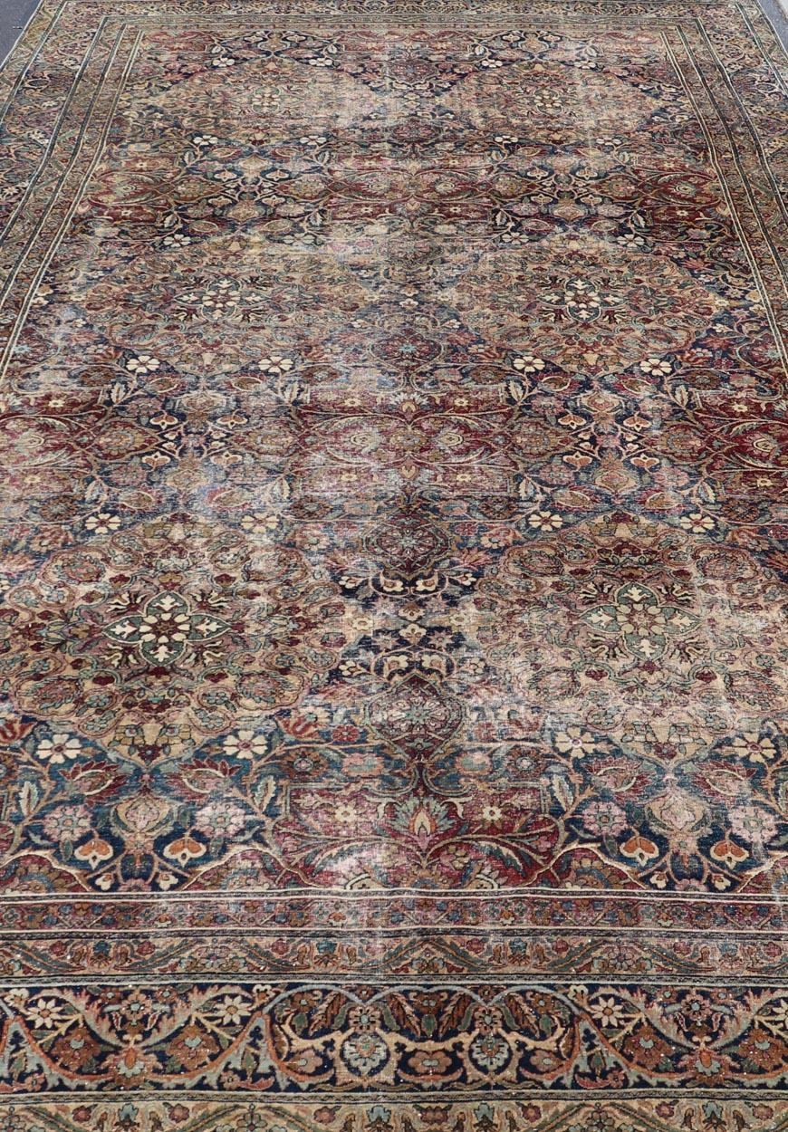 Antique Persian Lavar Kerman Large Gallery Rug with All-Over Floral Design. Keivan Woven Arts / rug V21-0308-151, country of origin / type: Iran / Lavar Kerman, circa 1900.

Measures: 8'3 x 14'9 

This large, antique Persian Lavar Kerman rug