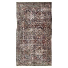 Grand tapis persan ancien Lavar Kerman à motifs floraux sur toute sa surface
