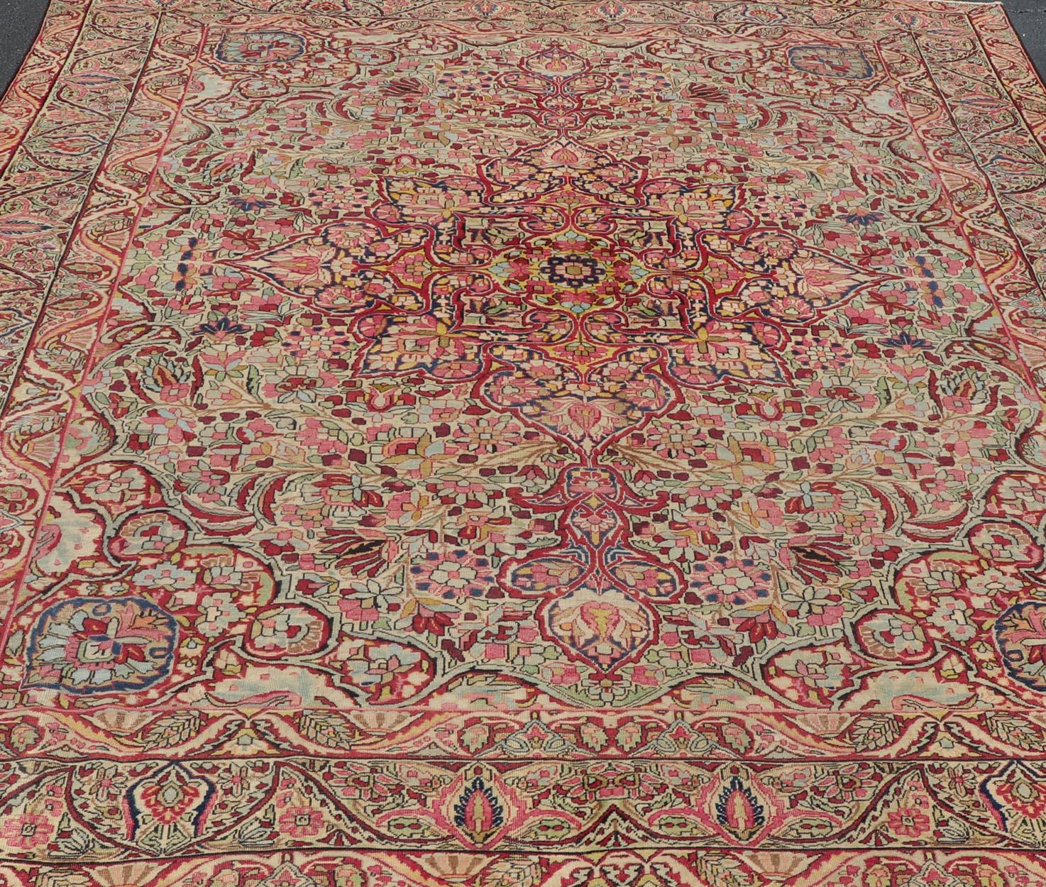 Antique Persian Lavar Kerman Rug With Intricate Medallion Design.  Keivan Woven Arts / Rug/C-0715, Laver Kerman, Antique Kerman, Antique Persian

Measures: 9'5 x 11'2

This antique Kerman Lavar rug bears a remarkably intricate floral design with a