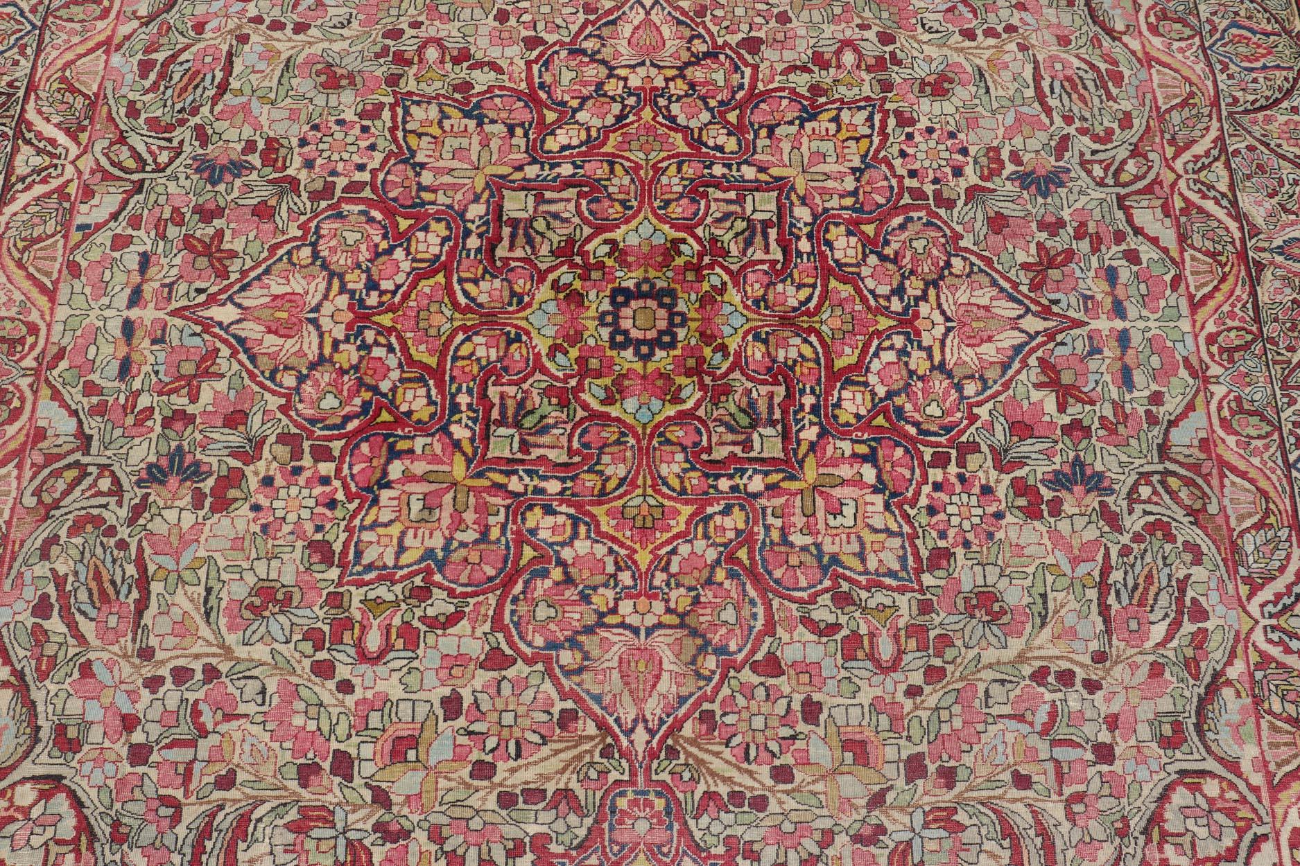 Hand-Knotted Antique Persian Lavar Kerman Medallion Rug With Intricate Design  For Sale