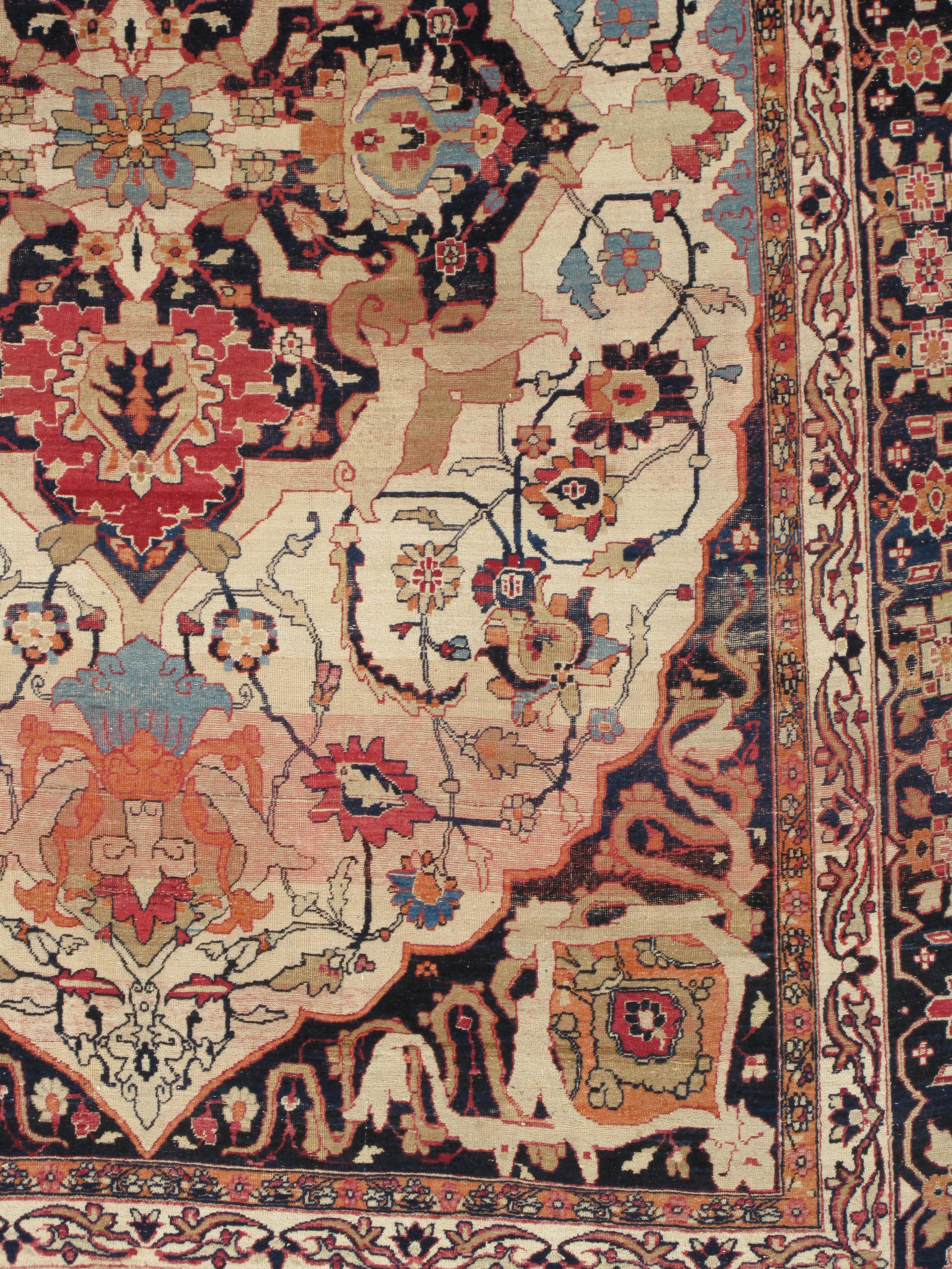 The Lavar Kerman Rug from Persia, dating to around 1850, is a striking example of 19th-century Persian weaving artistry. Measuring 6'5