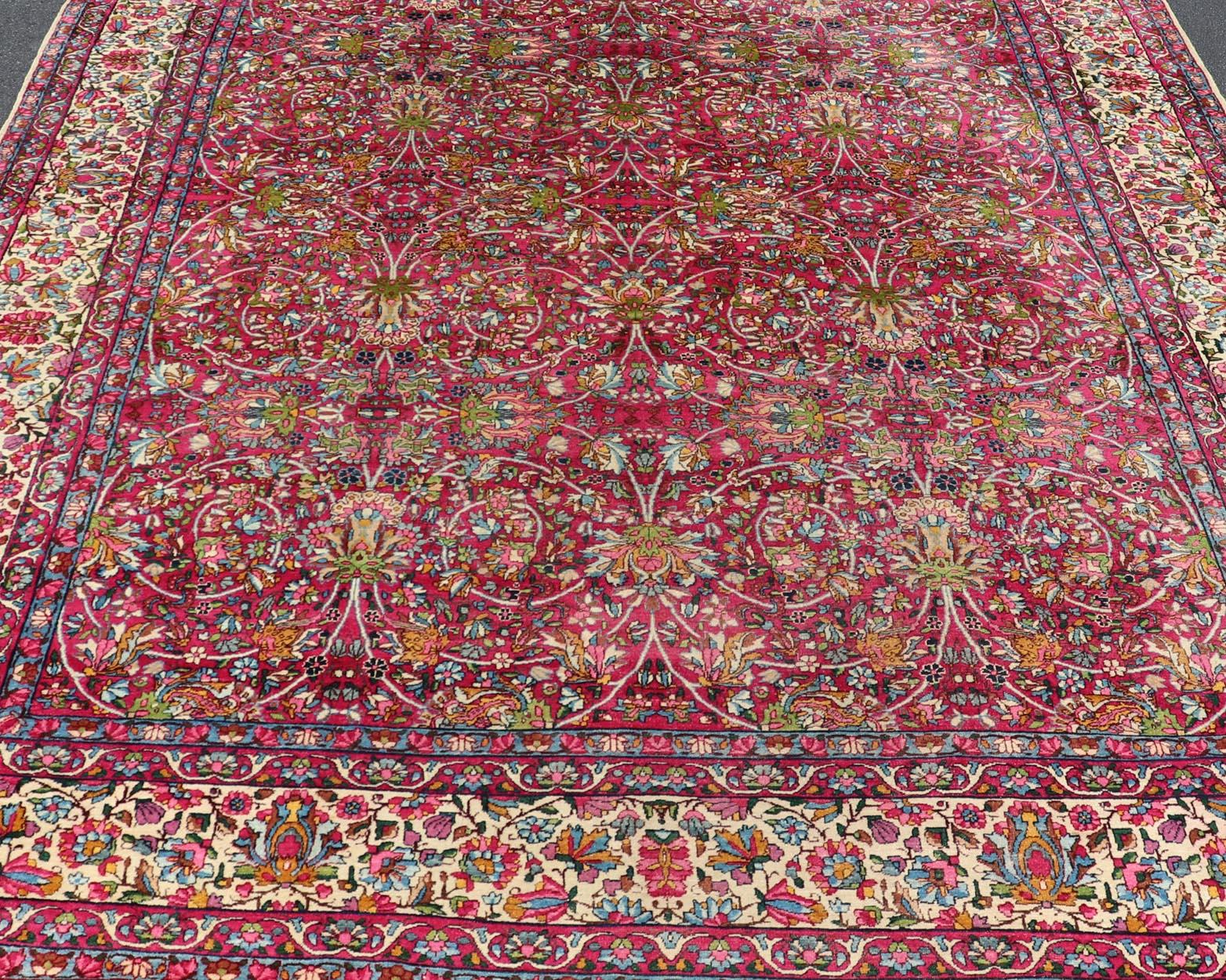  Antique Persian Lavar Kerman Rug with All-Over Floral Design In Jewel Tones. Keivan Woven Arts / rug A-0702, country of origin / type: Iran / Lavar Kerman, circa 1910
Measures: 9' x 12'.
This exquisite antique Lavar Kerman carpet originates from