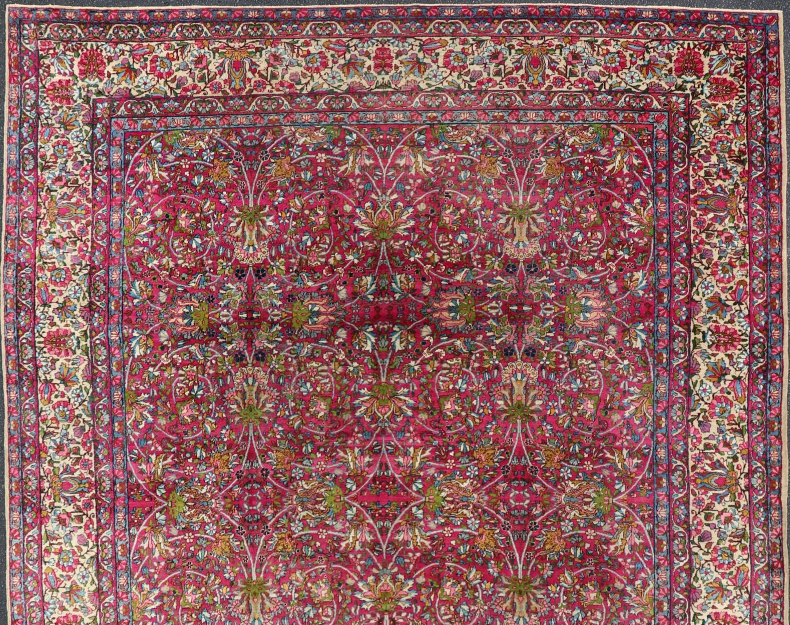 Wool  Antique Persian Lavar Kerman Rug with All-Over Floral Design In Jewel Tones  For Sale