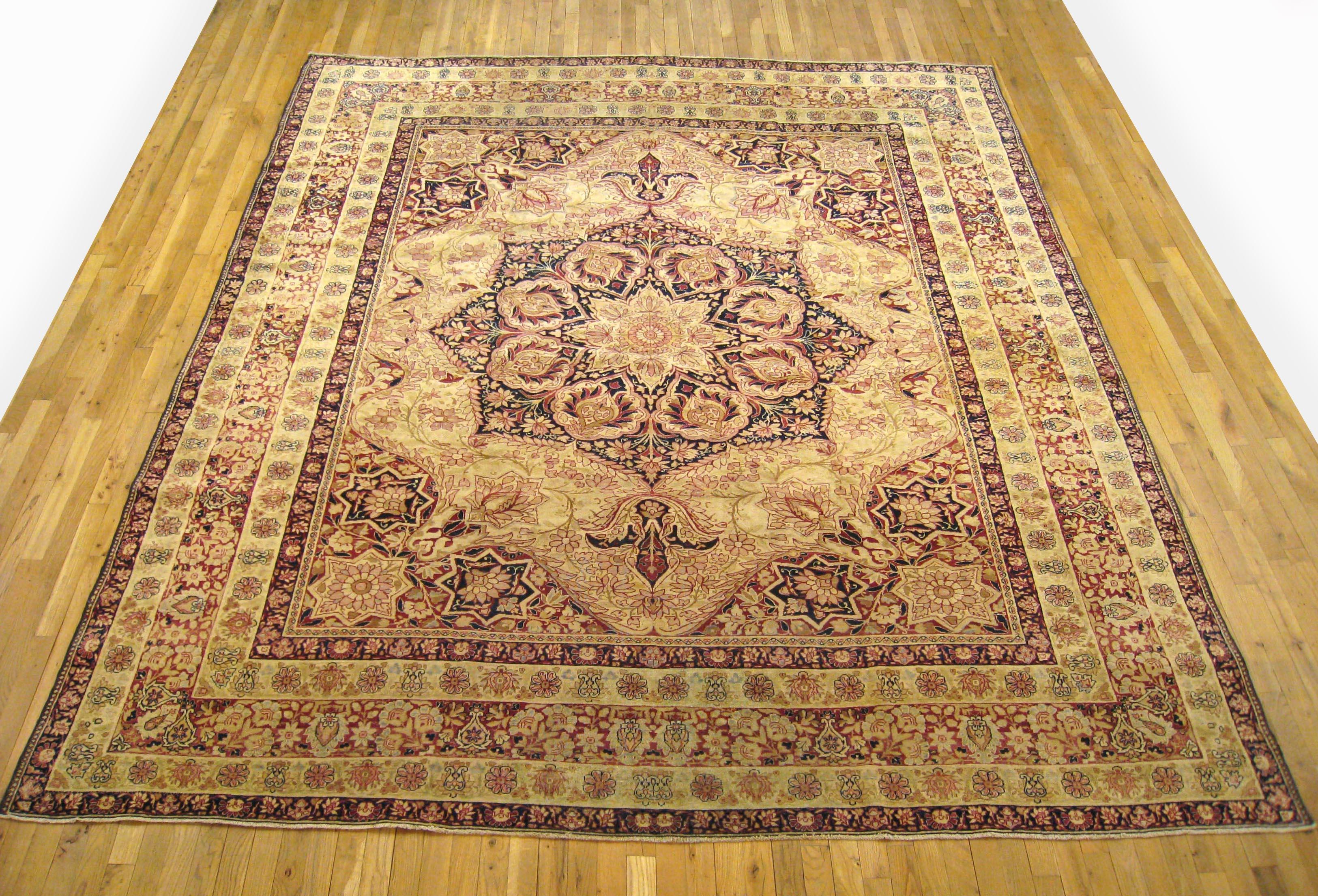 Antique Persian Lavar Oriental carpet, room size, circa 1890.

An antique Persian Lavar oriental carpet, size: 10'5