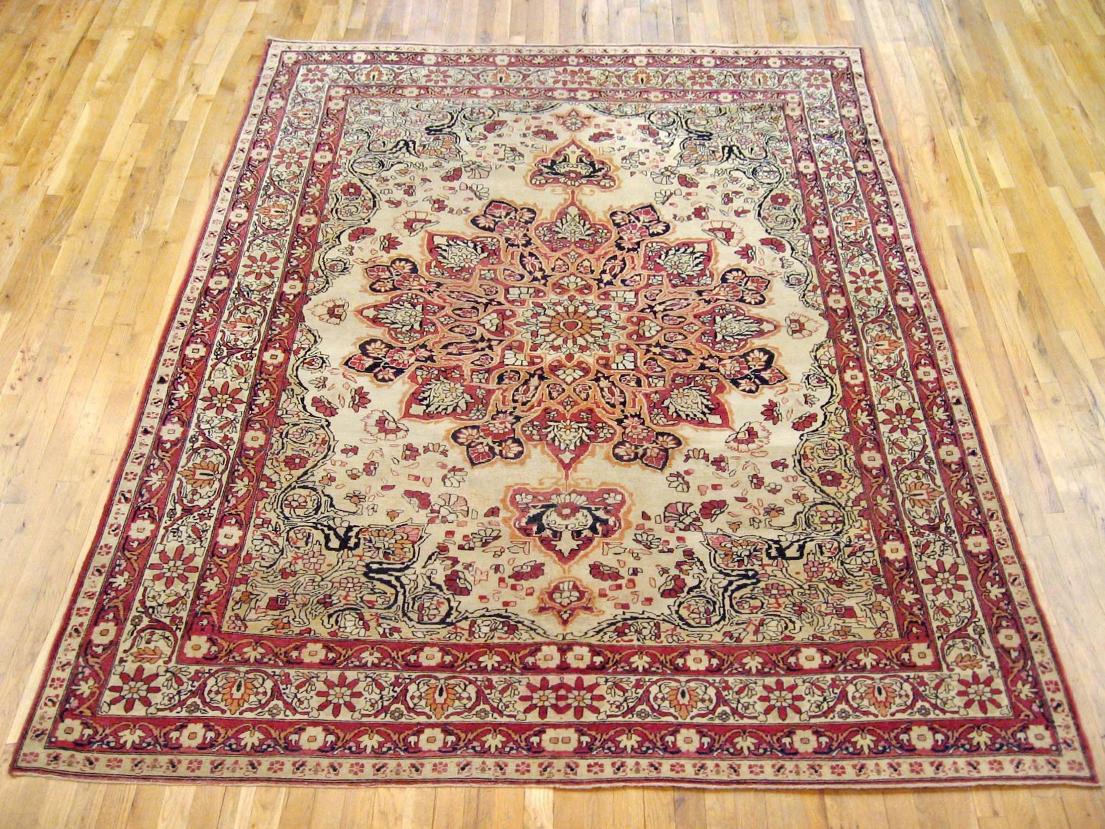 Antique Persian Lavar oriental carpet, room size, circa 1890.

An antique Persian Lavar oriental carpet, size: 10'0