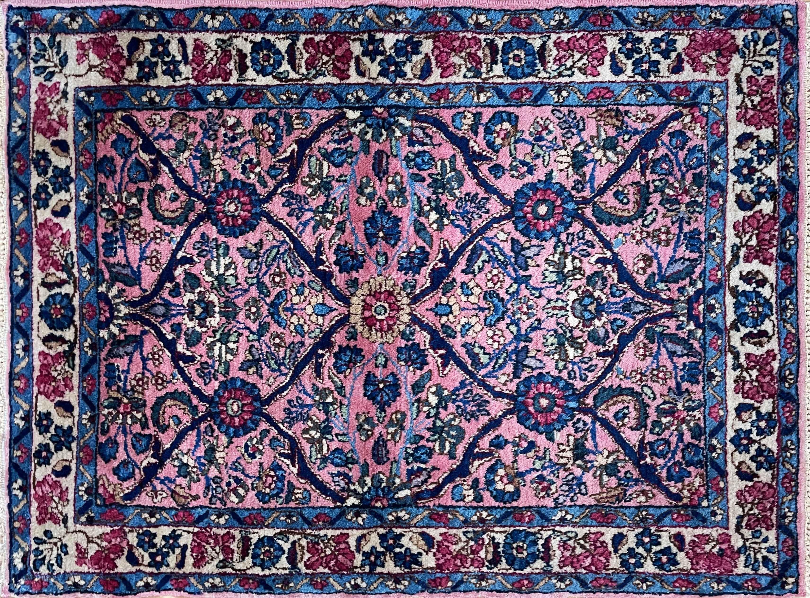 Discover the allure of the Kerman or Laver Kerman rug, a Southeast Persian treasure that captures a pictorial narrative of the Qajar kingdom. These rugs originate from a rich tradition dating back to the 16th century Safavid dynasty, marking Kerman