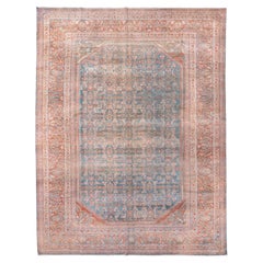 Antiker persischer Lilianenteppich mit floralem Medaillon-Design in Koralle und Himmelblau