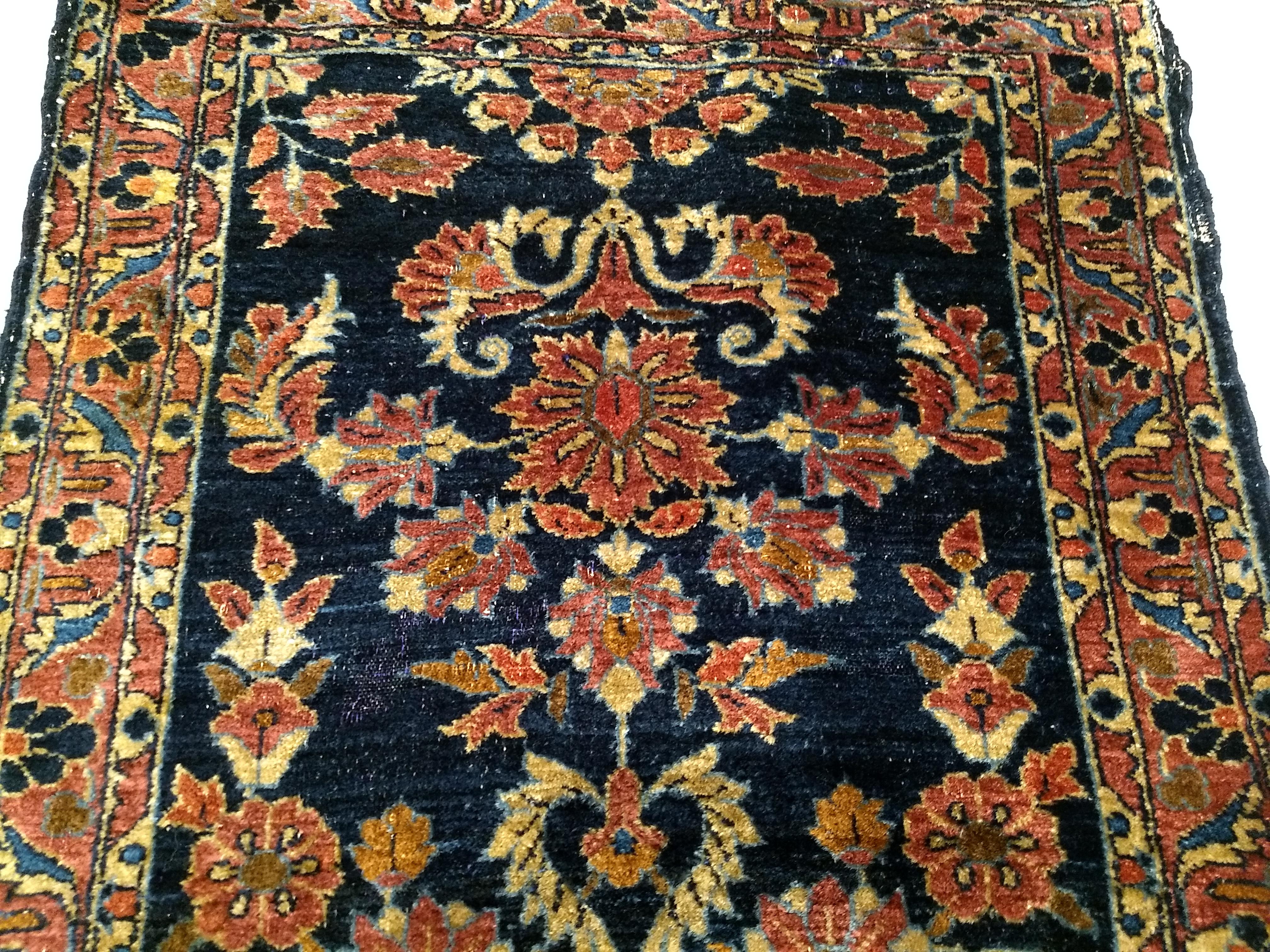 Early 20th Century Vintage Persian Lilian Runner in Allover Floral Design in Abrash Navy Blue, Pink For Sale