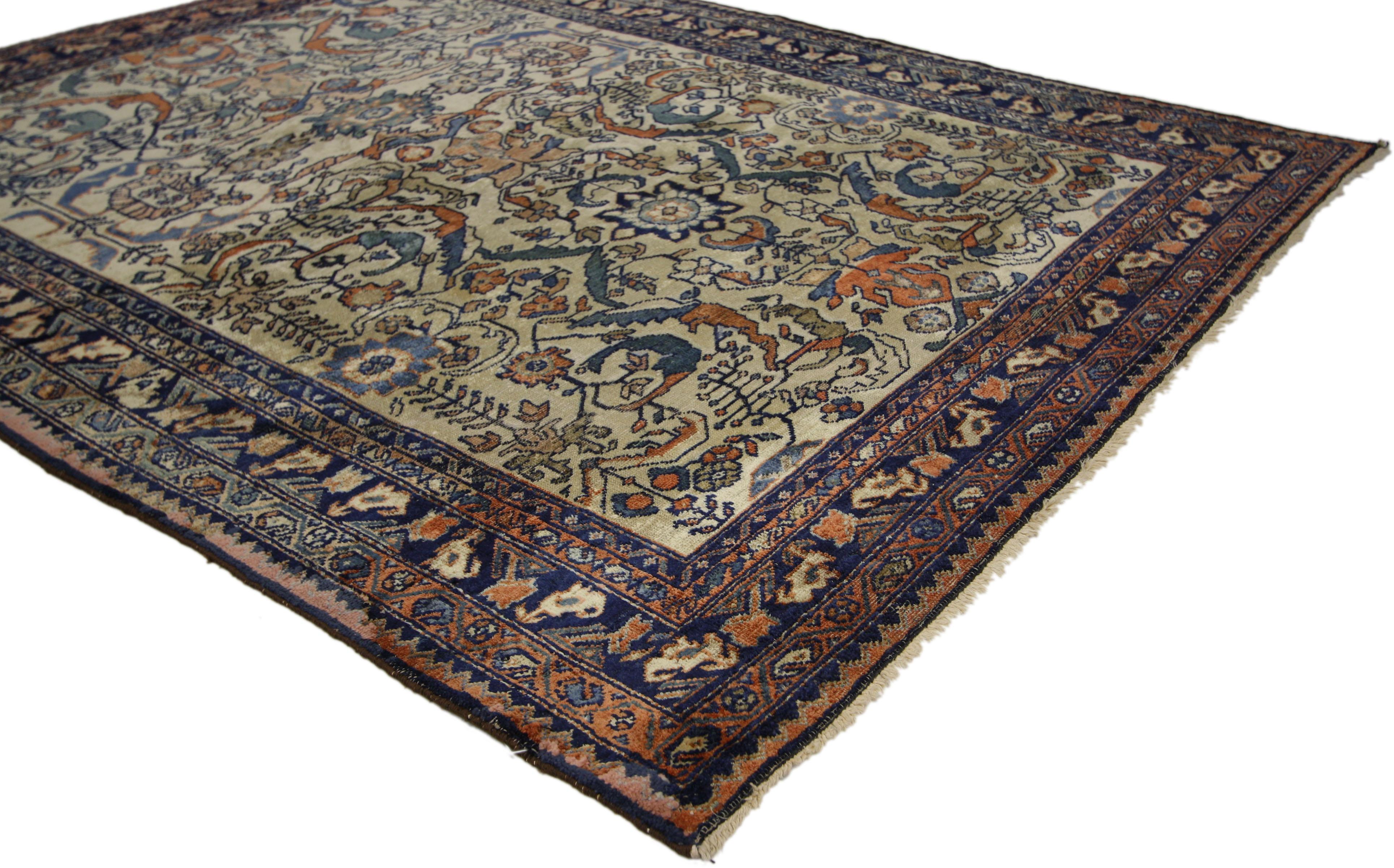 73623, Antique Persian Lilihan Area Rug with Rustic Romantic Industrial Style 04'10 x 06'01. This hand knotted wool antique Persian Lilihan area rug with Industrial style features poly-chromatic stylized florals and foliate patterns on a light color