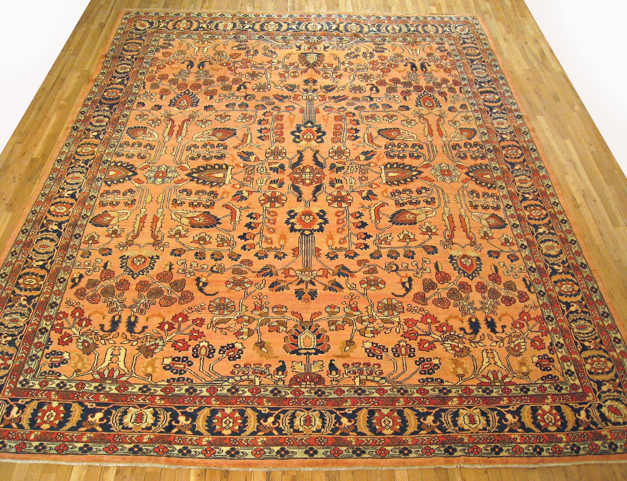Antique Persian Lilihan rug, room size, circa 1910

A one-of-a-kind antique Persian Lilihan Oriental Carpet, hand-knotted with soft wool pile. This lovely hand-knotted wool rug features floral elements allover the rose field, with an attractive blue
