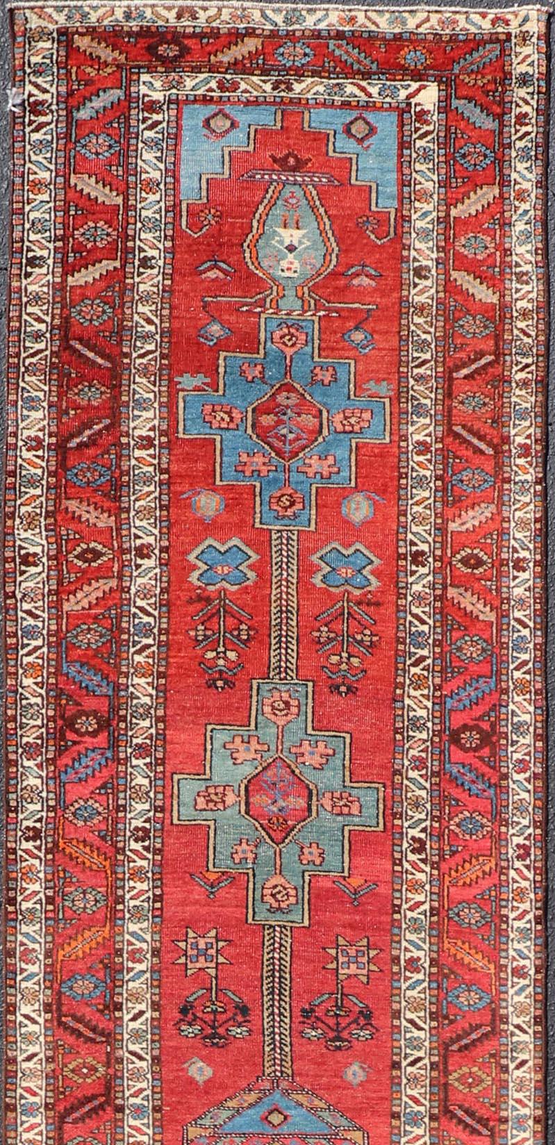 Hand-Knotted Antique Persian Long Persian Serapi Runner in Wool with Medallion Design For Sale