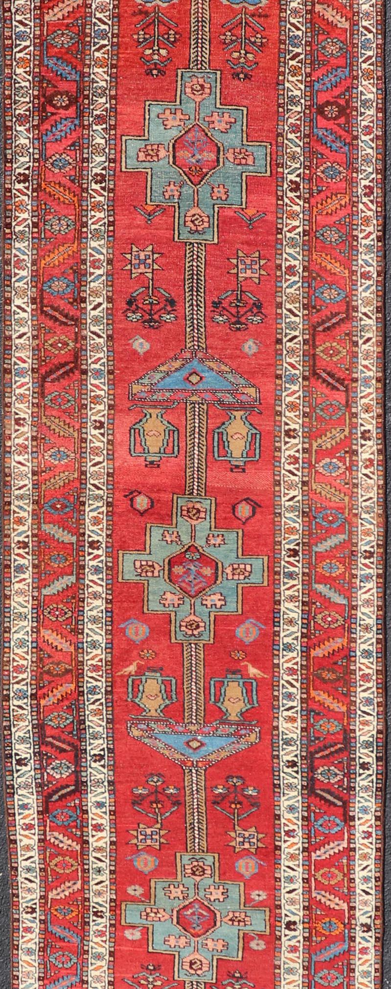 Antique Persian Long Persian Serapi Runner in Wool with Medallion Design In Good Condition For Sale In Atlanta, GA