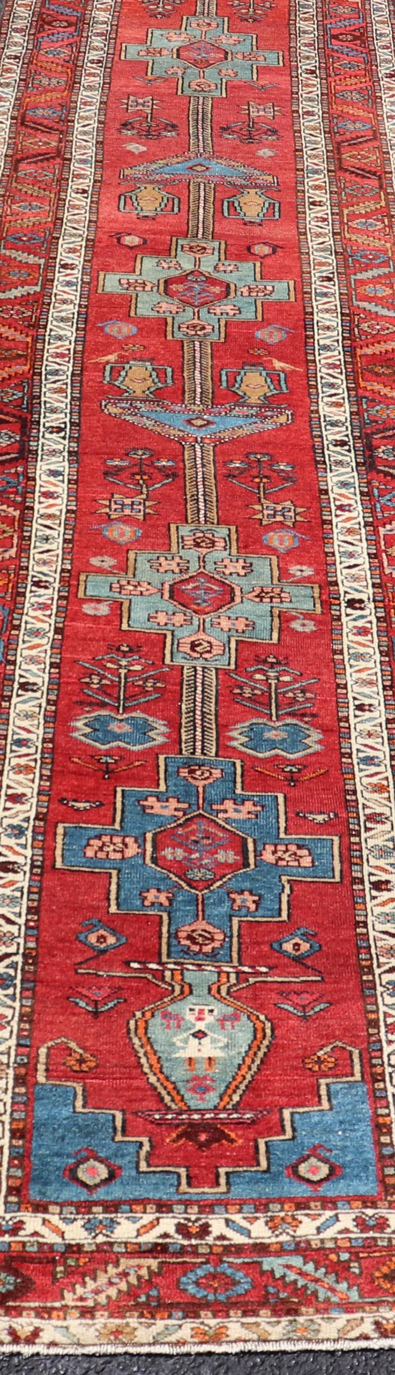 Antique Persian Long Persian Serapi Runner in Wool with Medallion Design For Sale 1