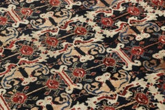Antique Persian Lori Rug with Geometric All-Over Medallions in Black and Red
