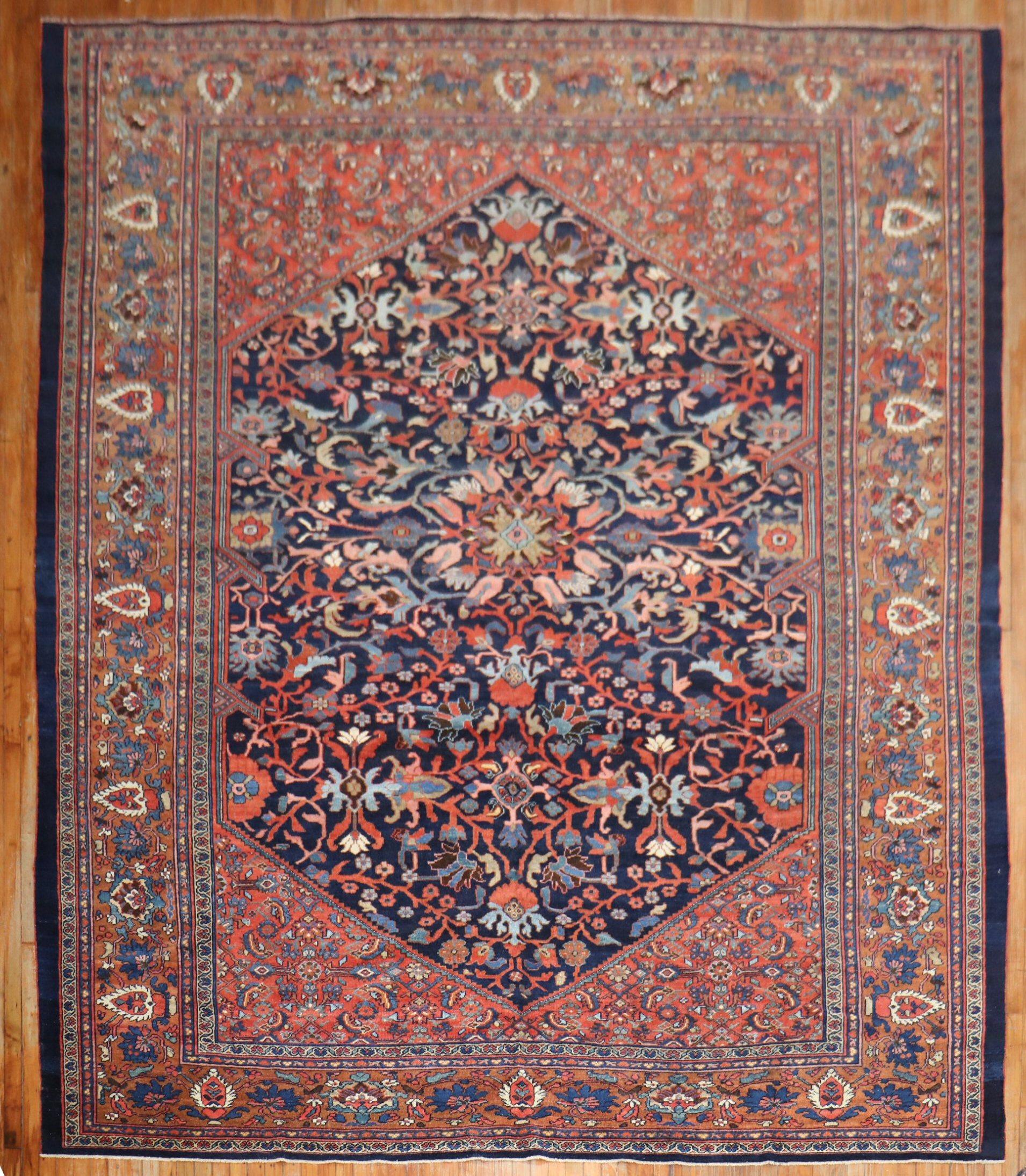 An early 20th century Persian Mahal rug.

Measures: 10'6'' x 13'3''.