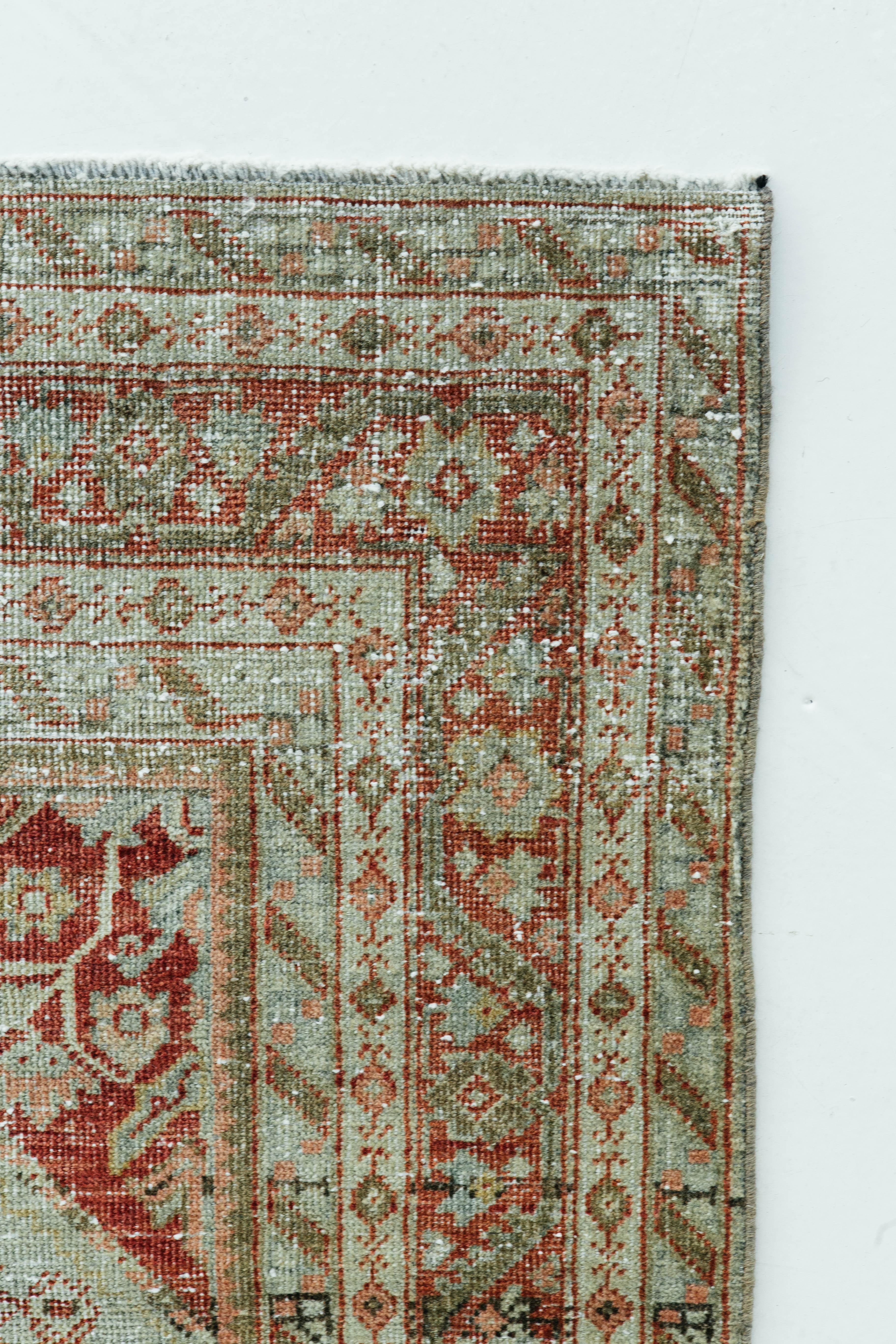 This antique Persian Mahal is both sophisticated and highly decorative. The rug's cohesive colors as well as geometric floral patterning is versatile and can be incorporated in almost any setting. Mahal rugs have strong aesthetic appeal and are