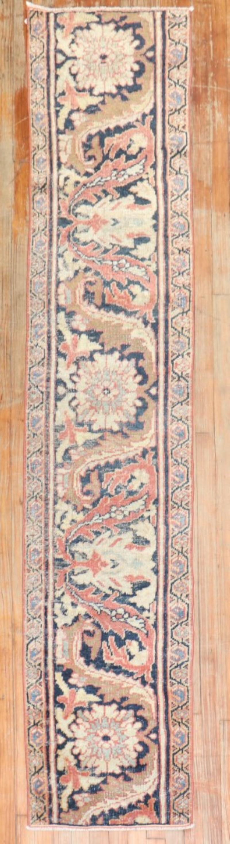 A Persian Mahal fragment Border runner from the late 19th century.

Measures: 1'9'' x 8'6''

Mahal Persian carpets from the 19th century and turn of the 20th century have become one of the most desirable among Persian village weaving's, as they