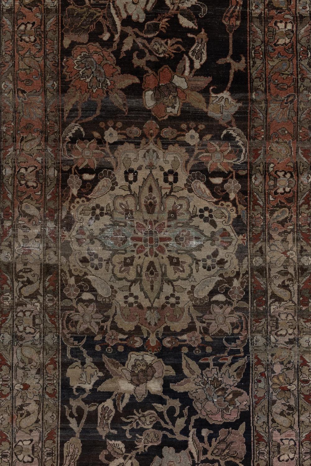 Age: first quarter of the 20th century

Pile: Low-medium 

Wear Notes: 3-4

Material: Wool on Cotton

Wear Guide:
Vintage and antique rugs are by nature, pre-loved and may show evidence of their past. There are varying degrees of wear to