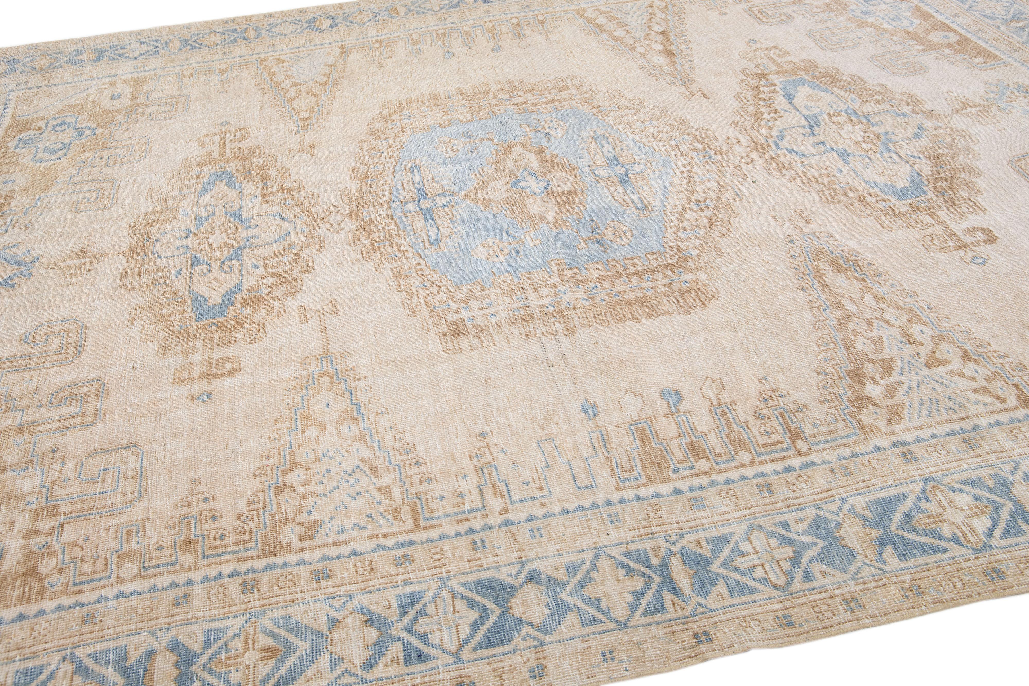 20th Century Antique Persian Mahal Handmade Beige & Blue Wool Rug with Tribal Design For Sale