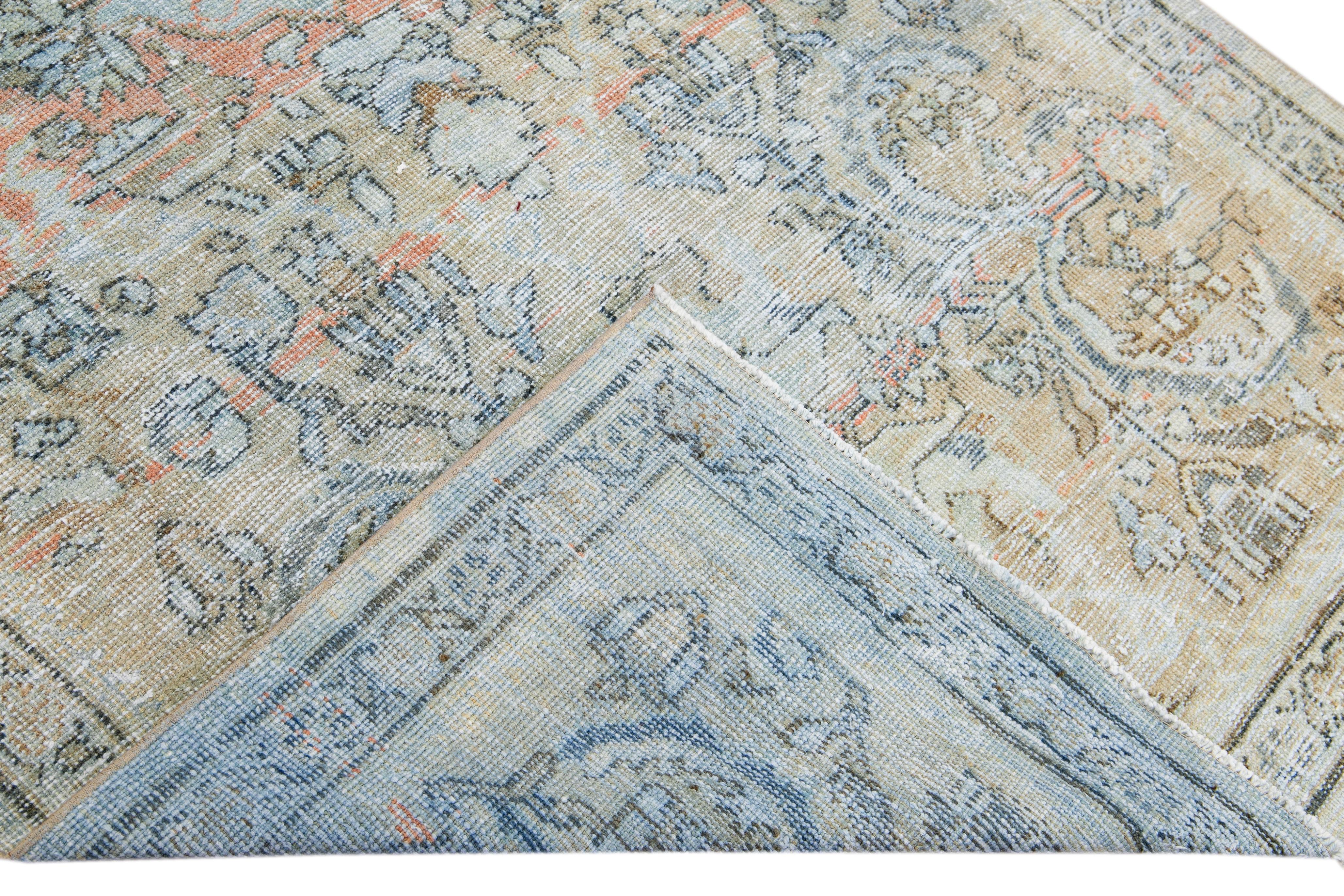 Beautiful antique Persian Mahal hand-knotted wool rug with a beige and orange field. This piece has a blue frame and accent in an all-over gorgeous floral design.

This rug measures: 4'6