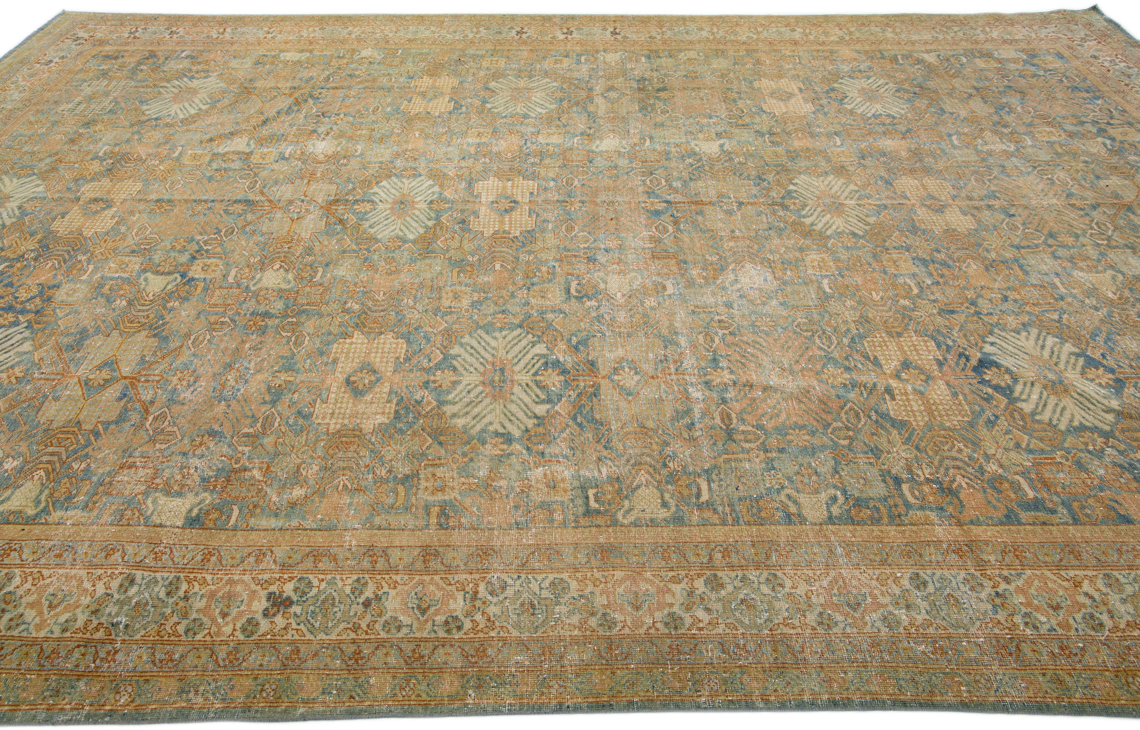 20th Century Antique Persian Mahal Orange & Blue Handmade Wool Rug with Floral Design For Sale