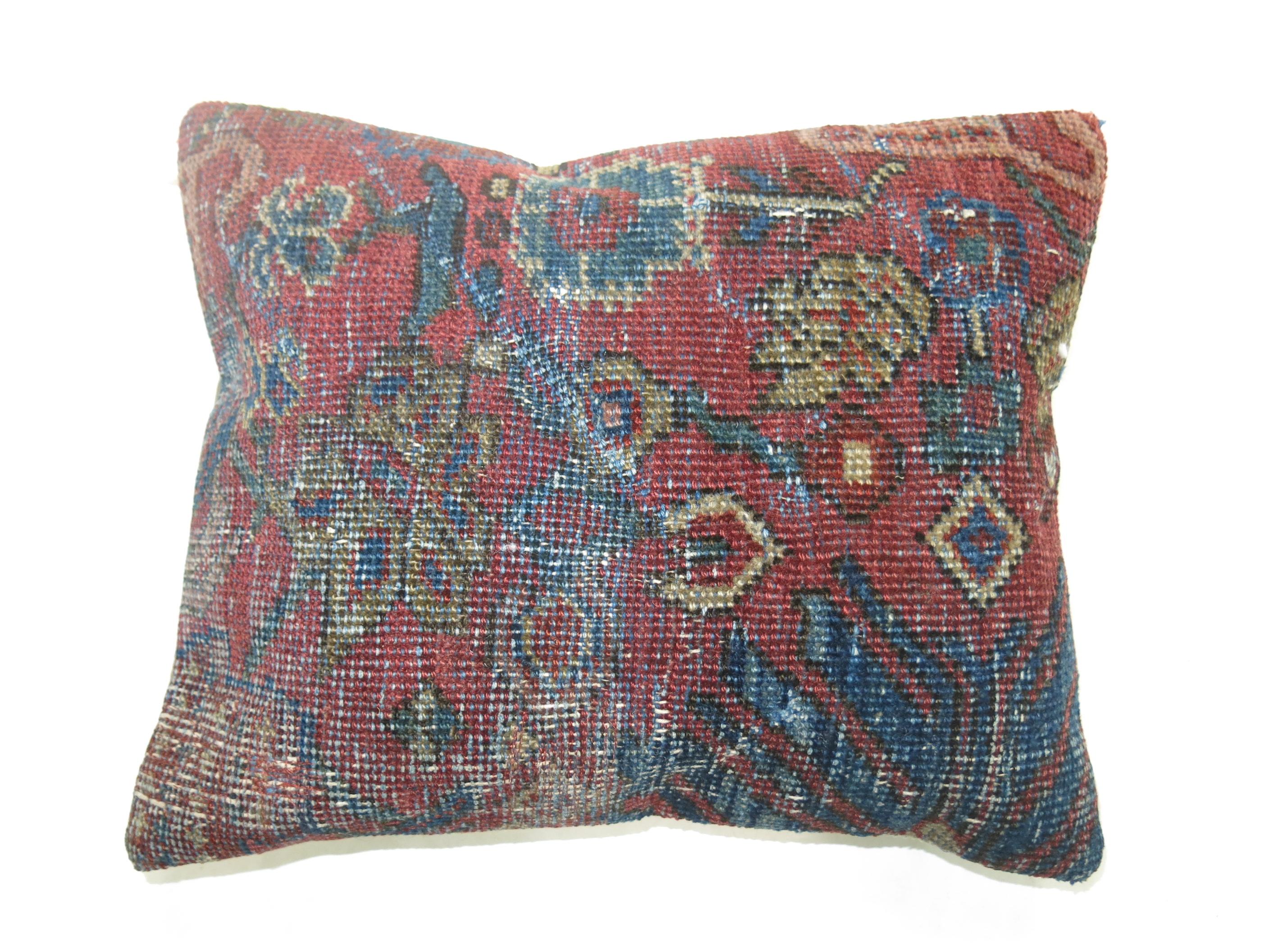 Pillow made from antique Persian Mahal rug with cotton back.

Measures: 13'' x 16''.