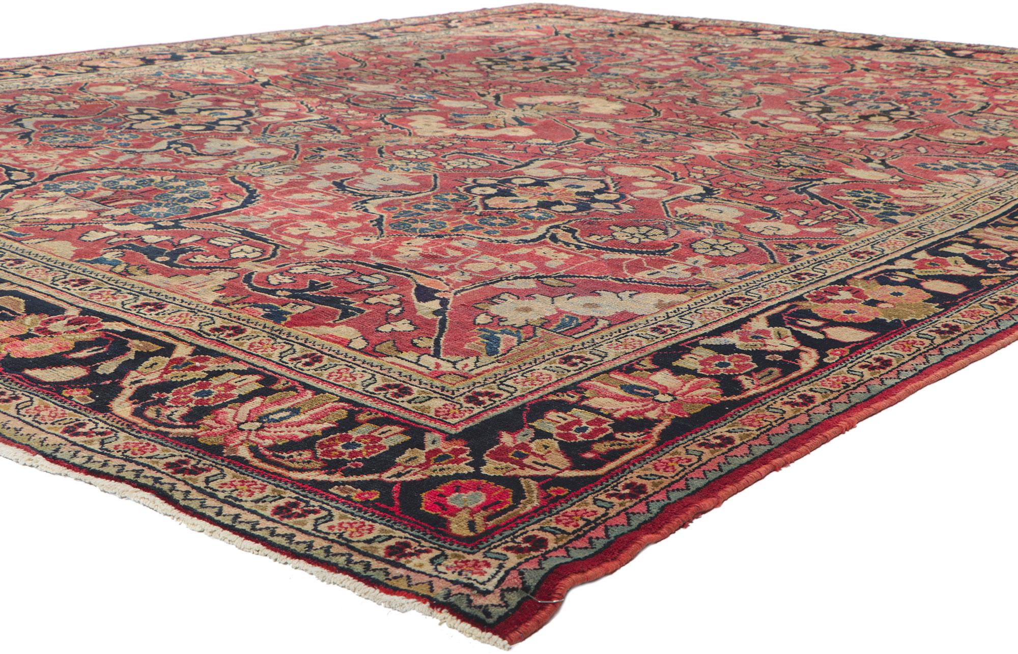 61168 Antique Persian Mahal rug 09'00 x 11'07. ?With timeless appeal, ornate decorative detailing, and effortless beauty, this hand knotted wool antique Persian Mahal rug is poised to impress. The abrashed field is covered in an all-over botanical