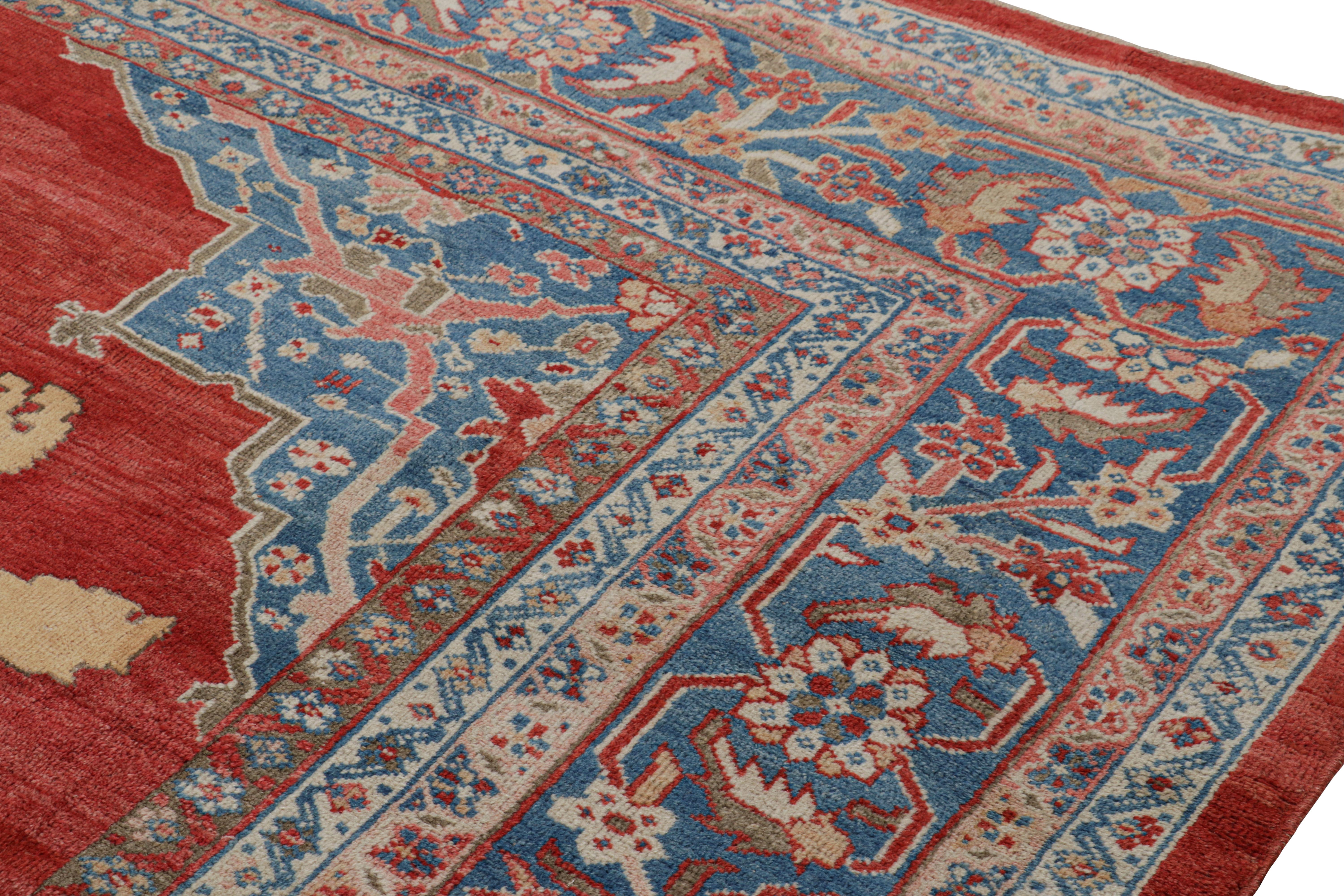 Alfombra persa antigua sobredimensionada en campo abierto rojo y leones pictóricos - Rug & Kilim Persa en venta