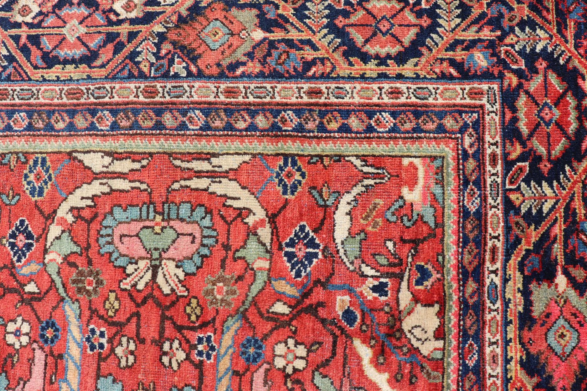 Persian antique Mahal rug with floral  design in soft red, Keivan Woven Arts / rug PTA-200706, country of origin / type: Iran / Sultanabad, circa early-20th century

Measures: 7'8 x 10'10.    

This Antique Persian Mahal/Sultanabad rug features a