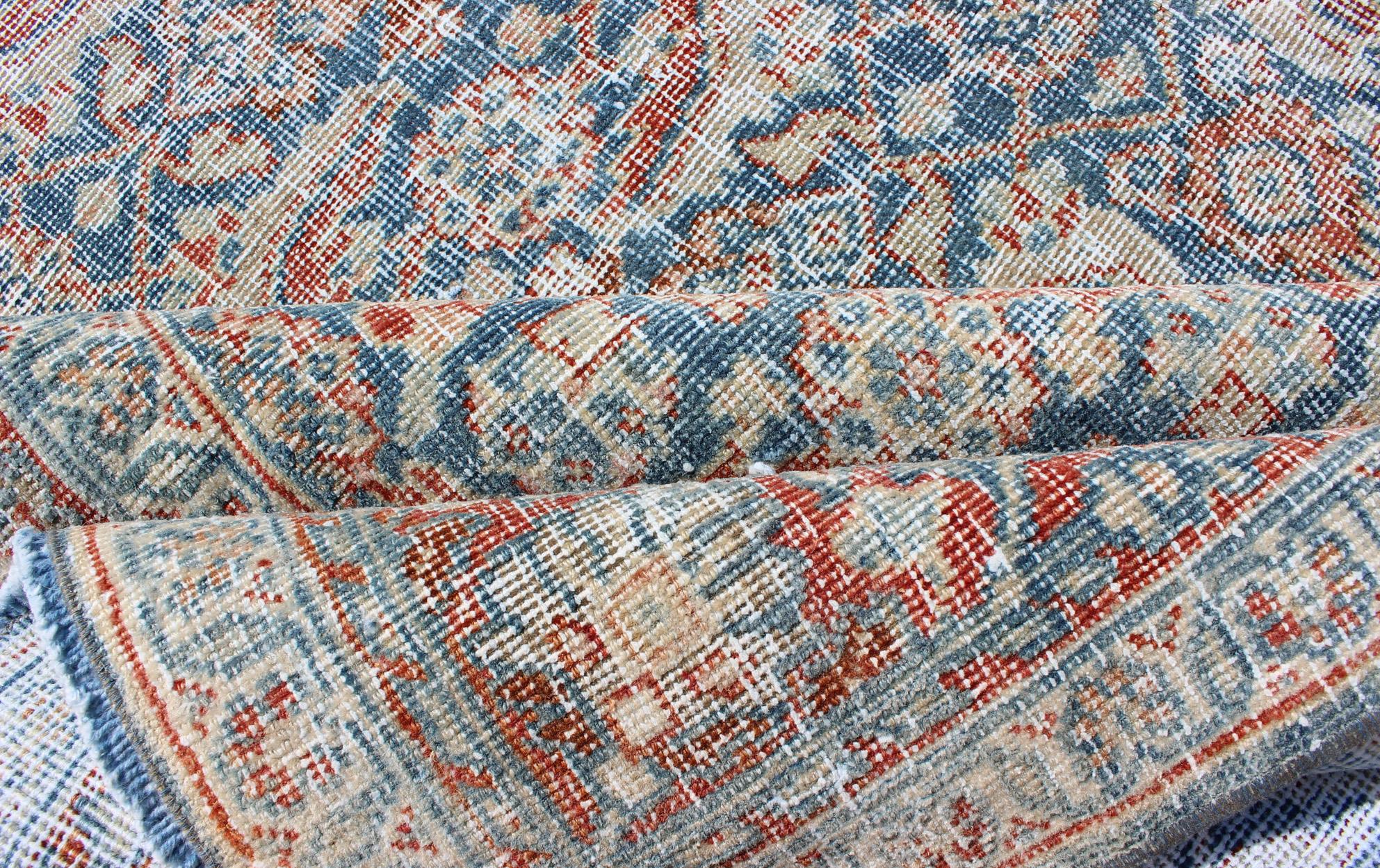 Antique Persian Mahal Rug with All-Over Flower Design in Blue with Red and Ivory In Distressed Condition For Sale In Atlanta, GA