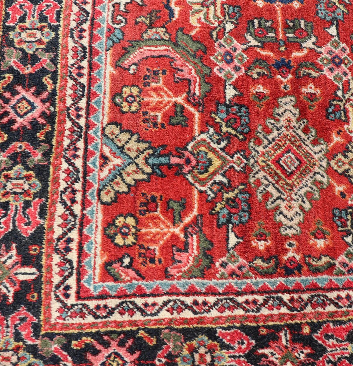 This rug is replete with an all-over symmetrical sub-geometric design set upon a red background and enclosed within a complementary border.

Persian Mahal carpet set on a red field, rug PTA-200714, country of origin / type: Iran / Sultanabad, circa