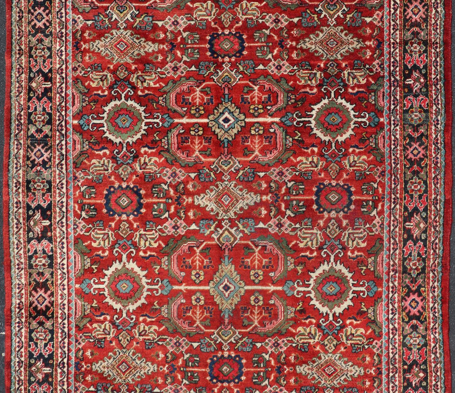 20th Century Antique Persian Mahal Rug with All-Over Sub-Geometric Design in Red Background For Sale