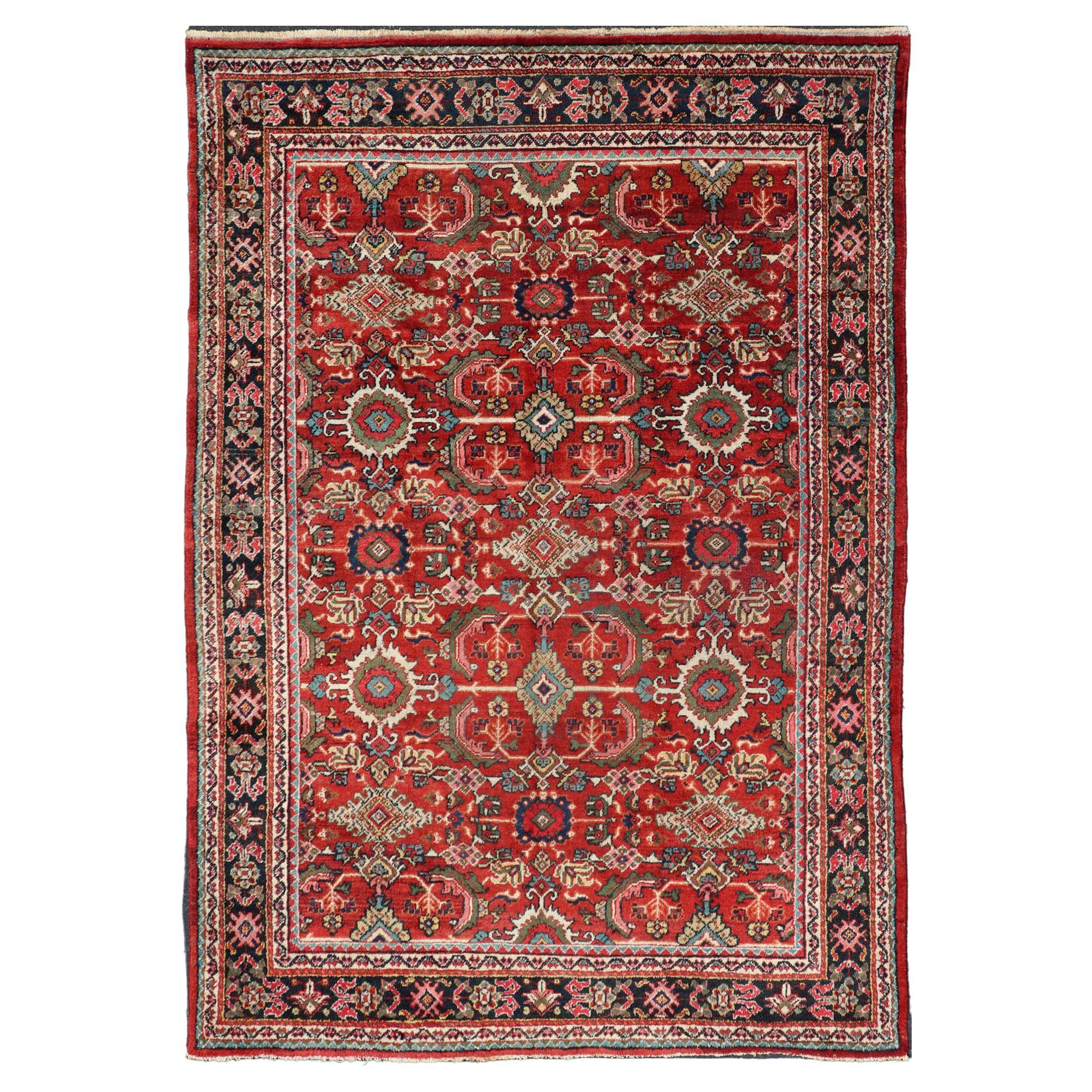 Antiker persischer Mahal-Teppich mit überdimensionalem, subgeometrischem Design auf rotem Hintergrund