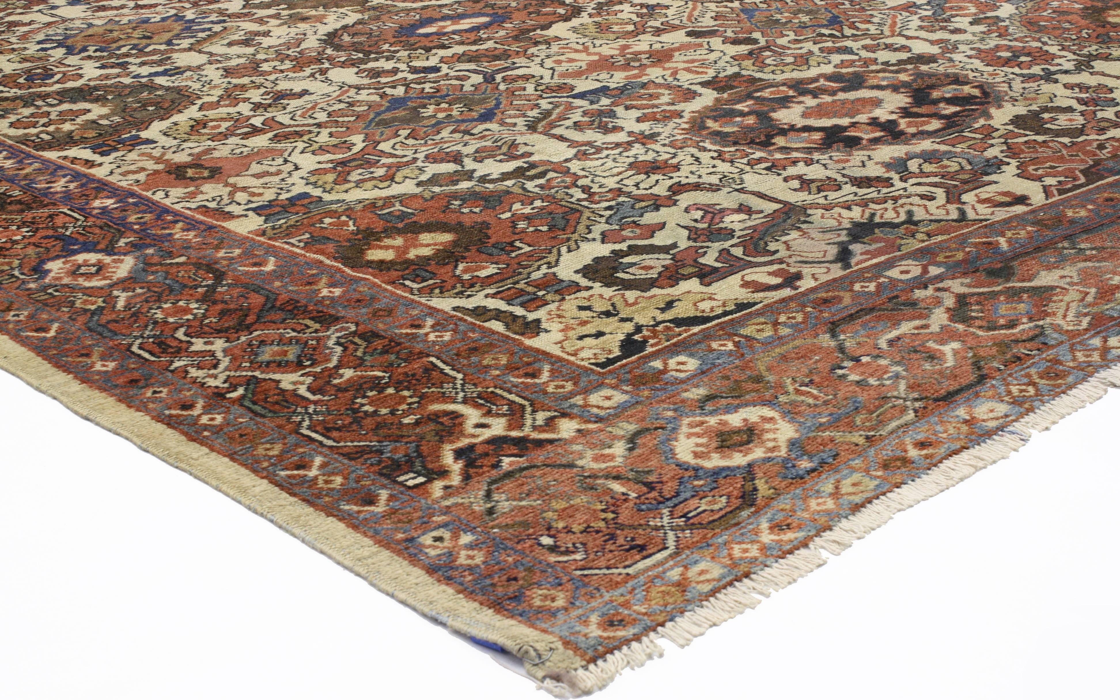 72575, antique Persian Mahal rug with Rustic American Colonial style. Warm and inviting with a timeless design, this hand knotted wool antique Persian Mahal rug features a large-scale all-over geometric botanical pattern composed of palmettes,