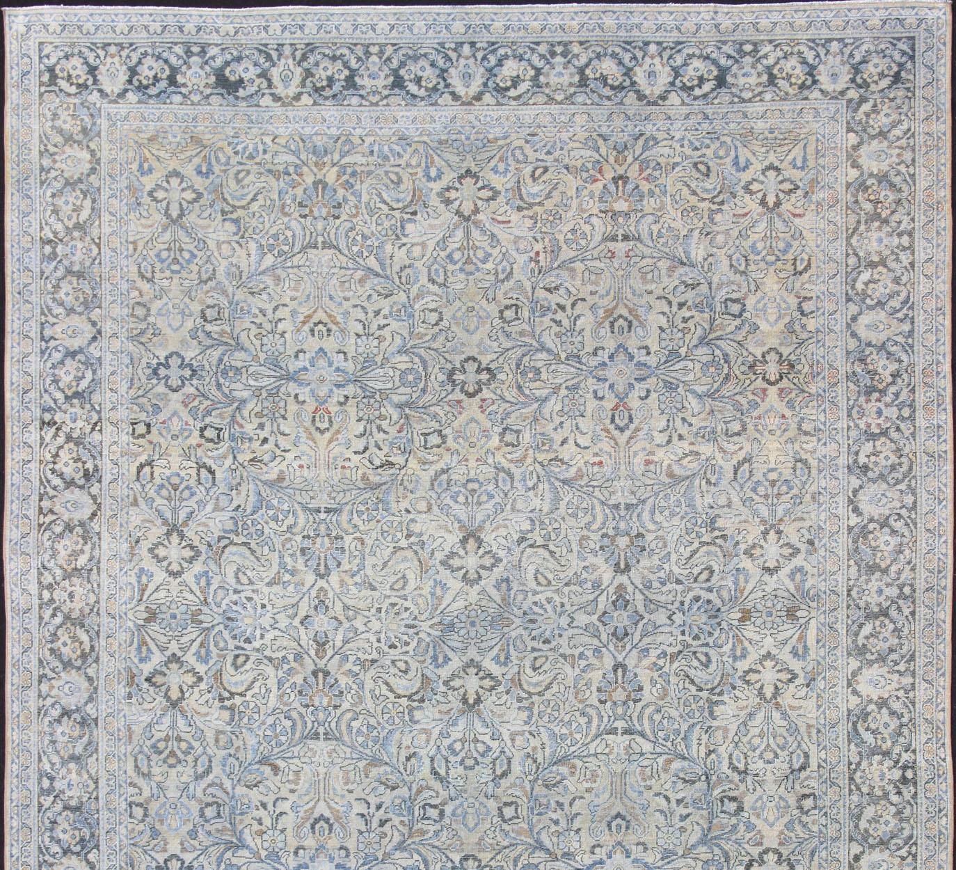 Cream, charcoal, blue, charcoal and light brown and blue antique Persian Mahal rug with sub-floral all over design, rug / SUS-2009-662, country of origin / type: Iran / Mahal, circa 1920
This antique Persian Mahal rug, circa early 20th century,