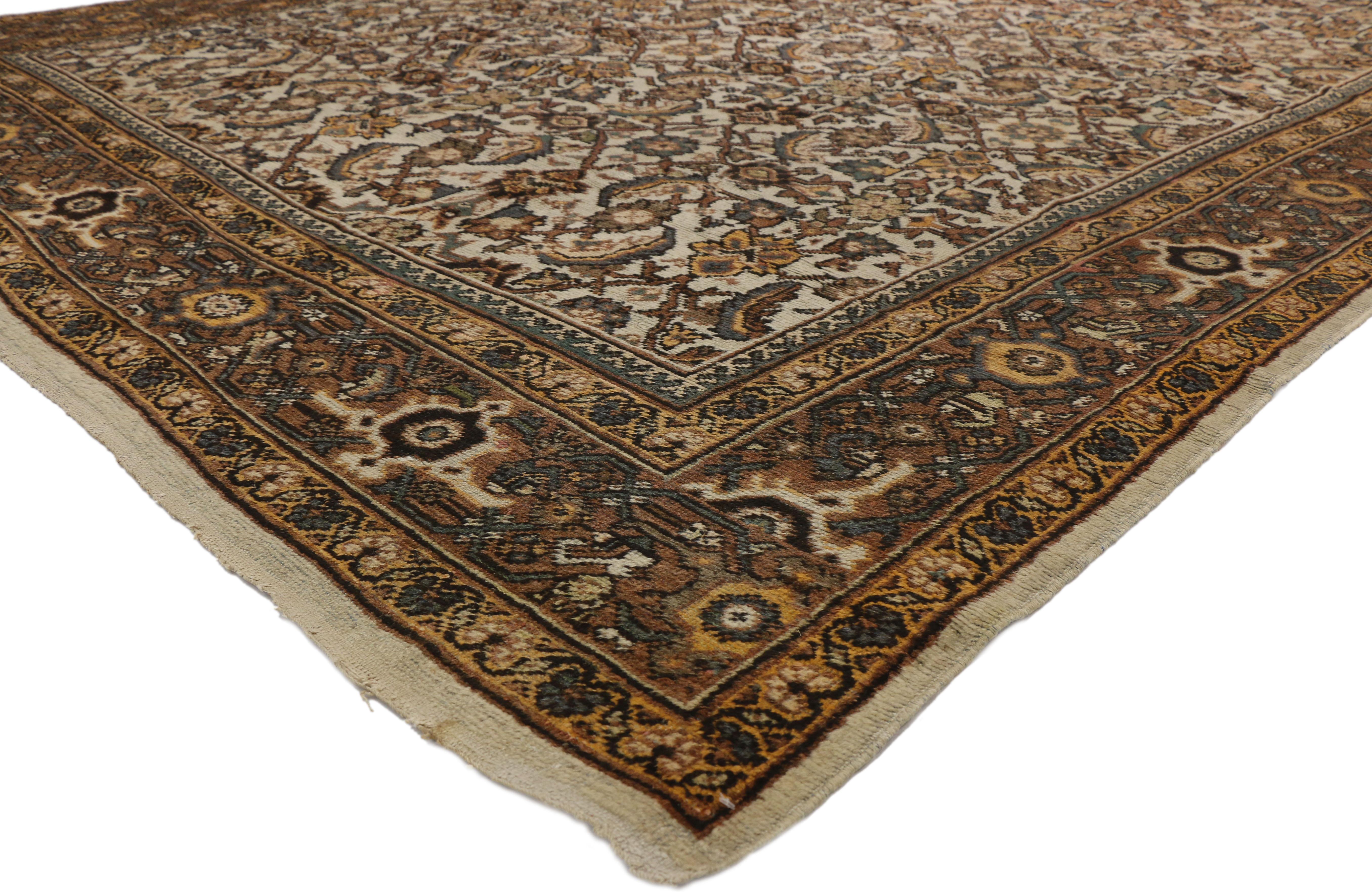 72504 Antique Persian Mahal Rug with Herati Pattern and Rustic Arts & Crafts Style. Sophisticated and full of character, this antique Persian Mahal rug combines traditional character with mid-century modern style. With its bold elemental nature and