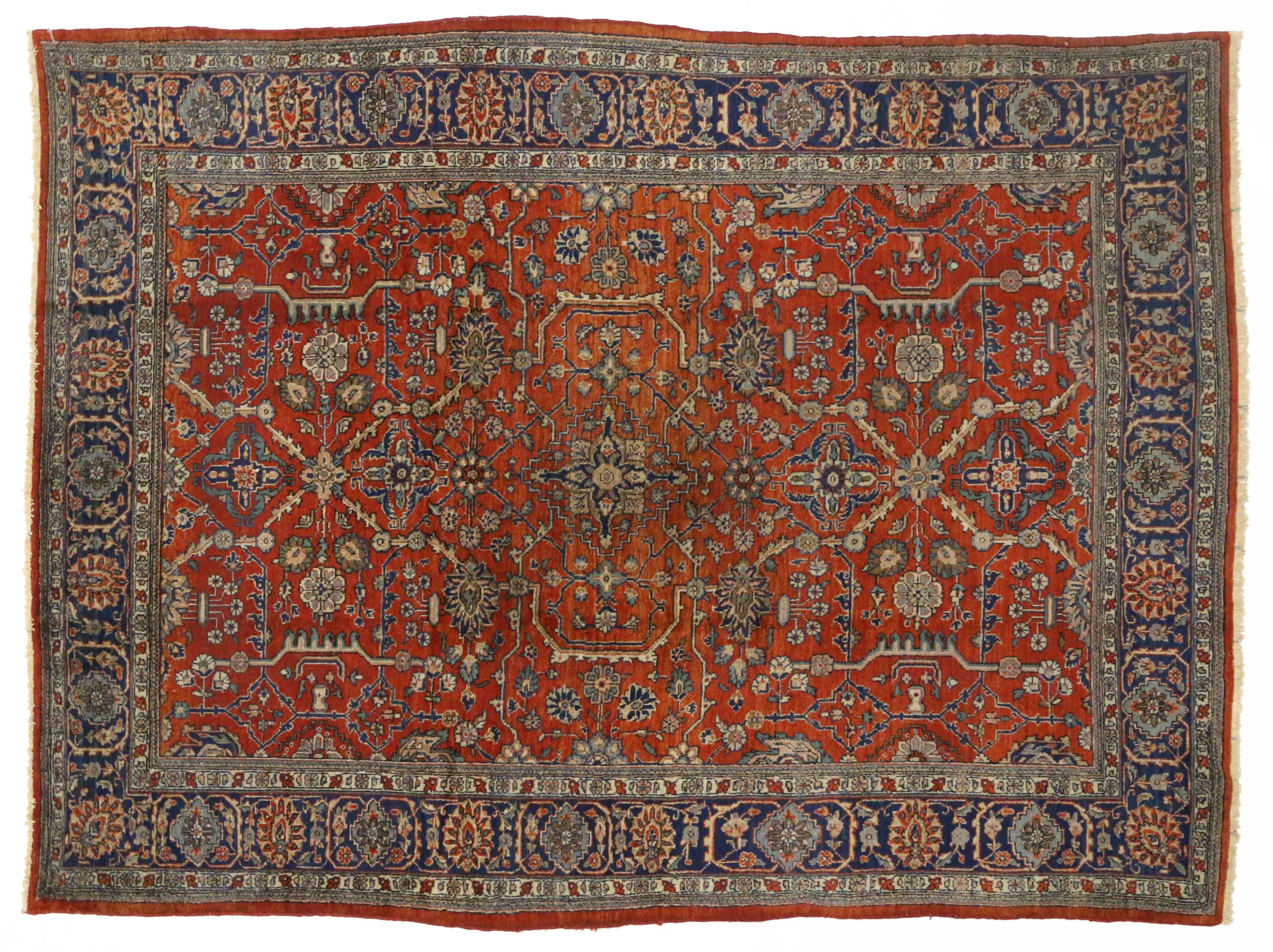 This antique Persian Mahal area rug offers a finely drawn, understated all-over geometric pattern with a brilliant red field to create a highly distinctive atmosphere. Its remarkably refined weave intensifies the rhythmic botanical pattern and