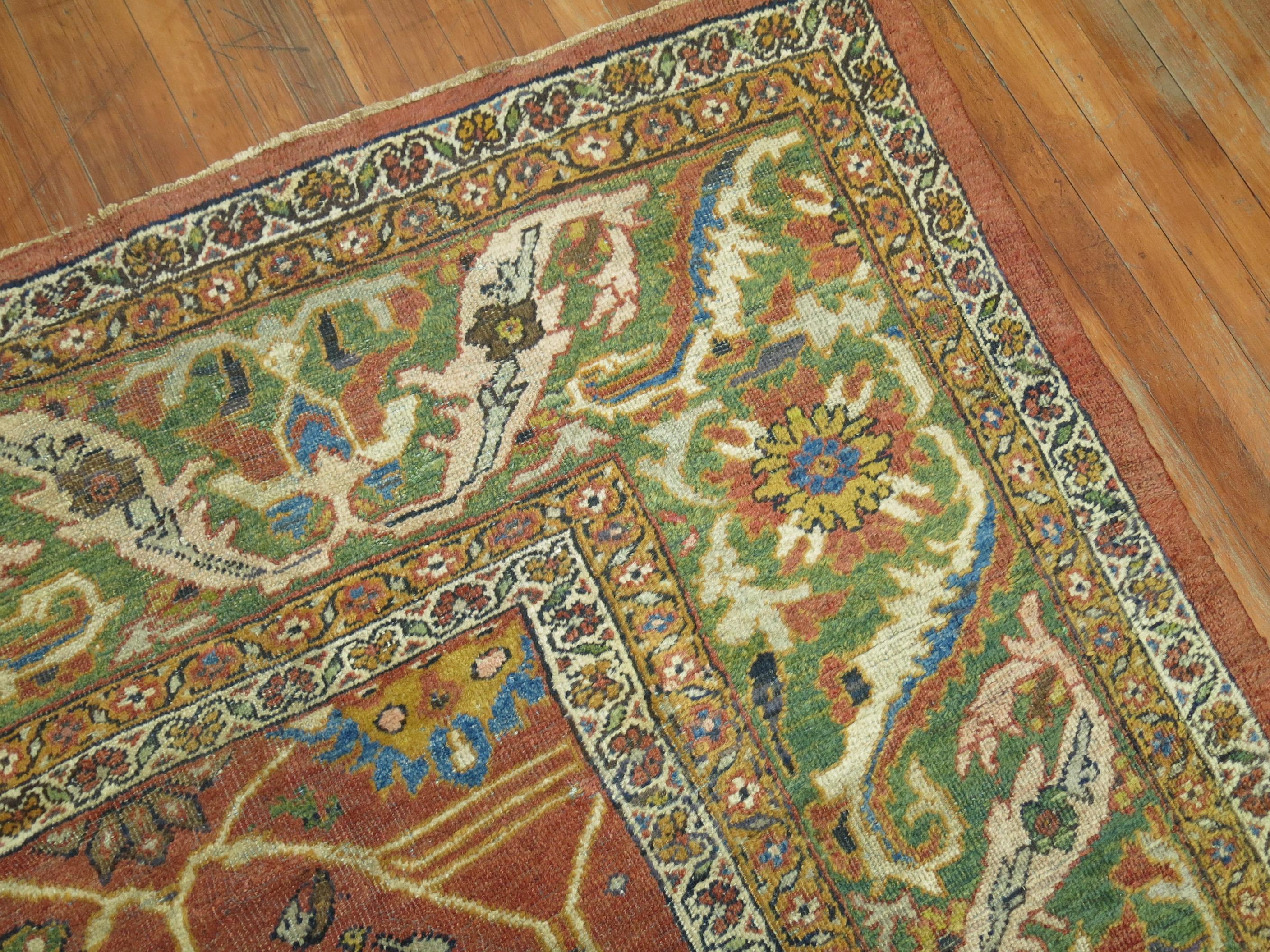 An authentic early 20th century room size Persian Mahal Sultanabad rug.

