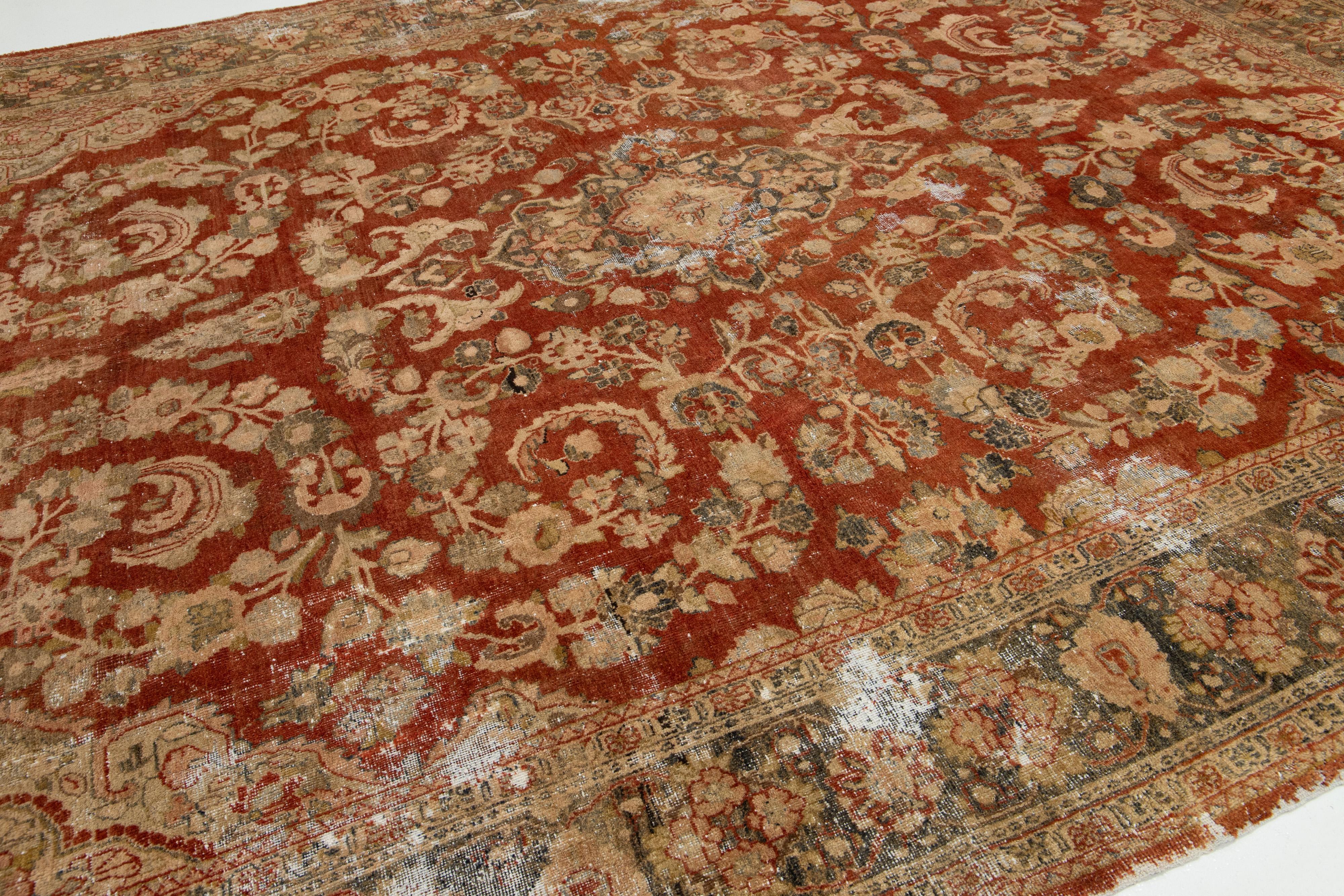 Antique Persian Mahal Wool Rug In Rust Color with Floral Design In Fair Condition For Sale In Norwalk, CT