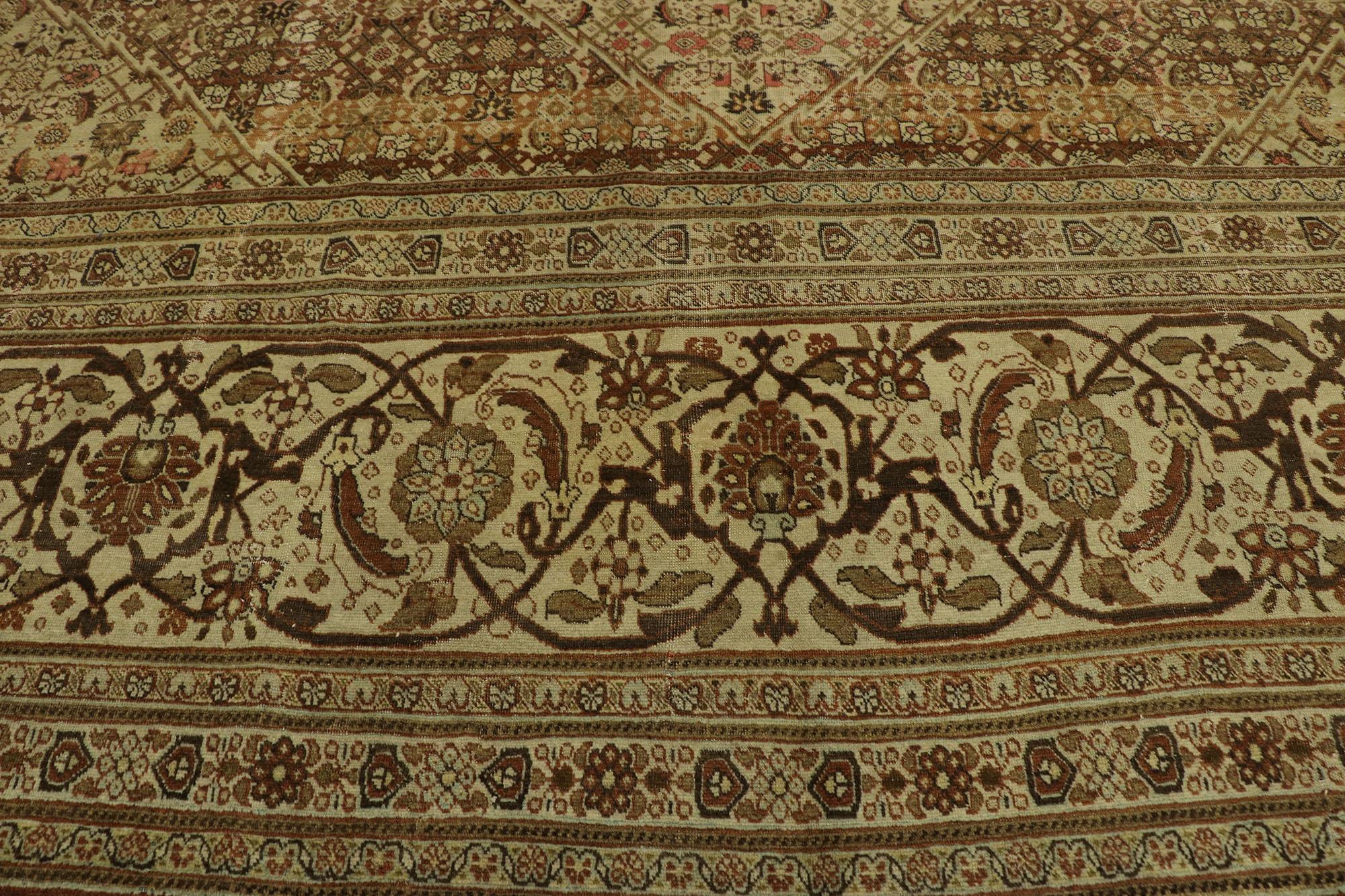 20th Century Antique Persian Tabriz Rug, Rustic Sensibility Meets Earth-Tone Elegance For Sale