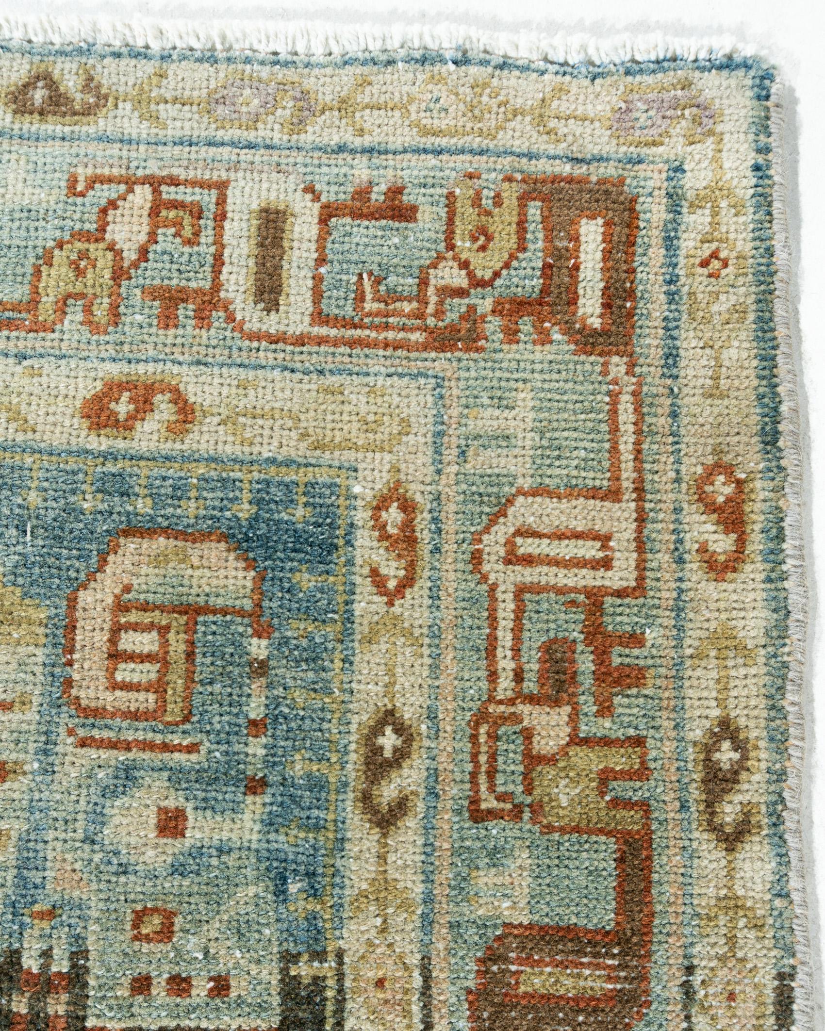 Antique Persian Malayer Area rug, measures 3'6 X 5'. Rugs from Malayer, east of Hamadan, could be considered top quality Hamadan’s and they share similar structural aspects. The wonderful soft pastel blues of the border contrast so well with the