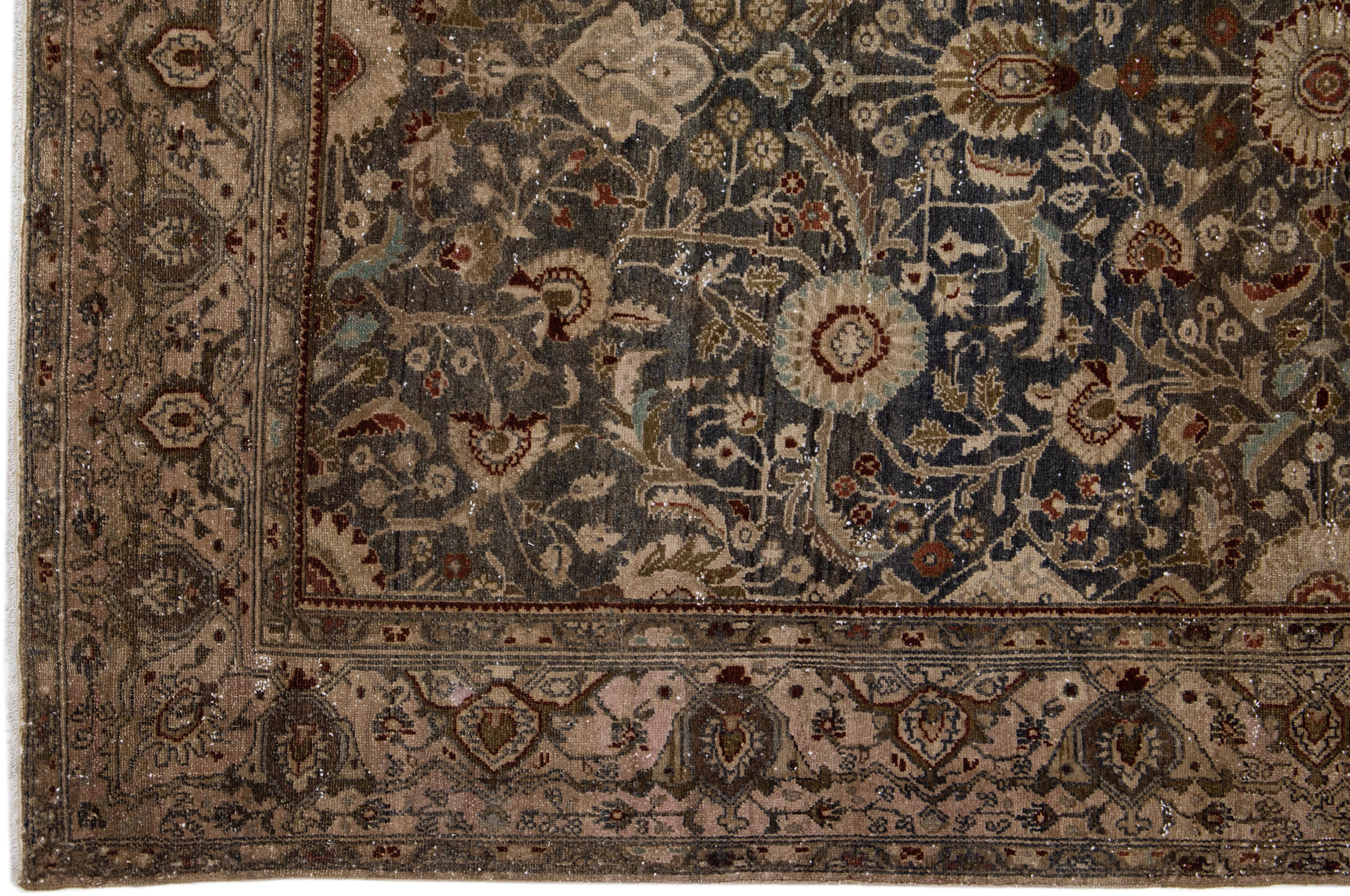 20th Century Antique Persian Malayer Blue Wool Rug with Medallion Floral Design For Sale